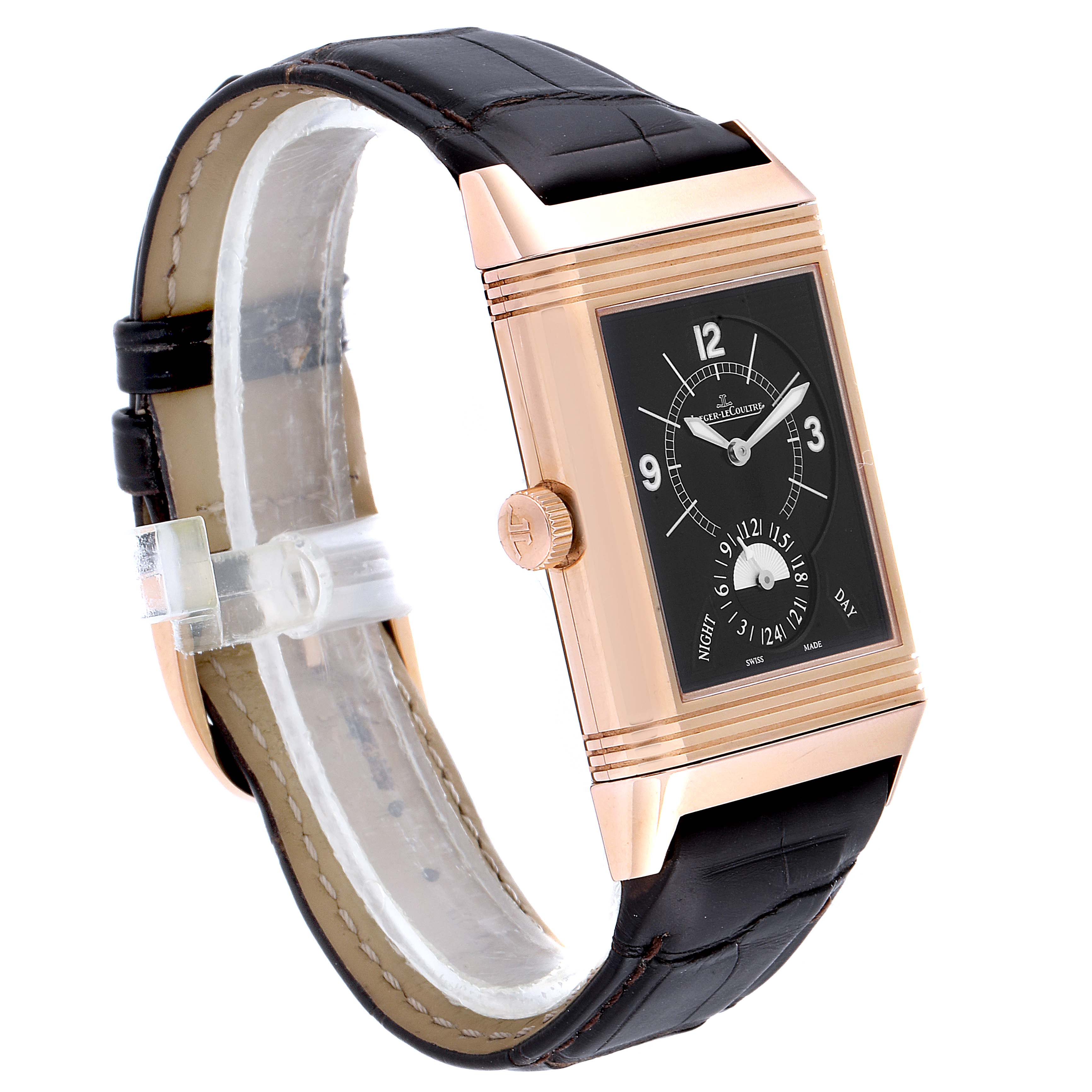 The Jaeger-LeCoultre Reverso watch is shown from a front-side angle, displaying the face, strap, and crown.