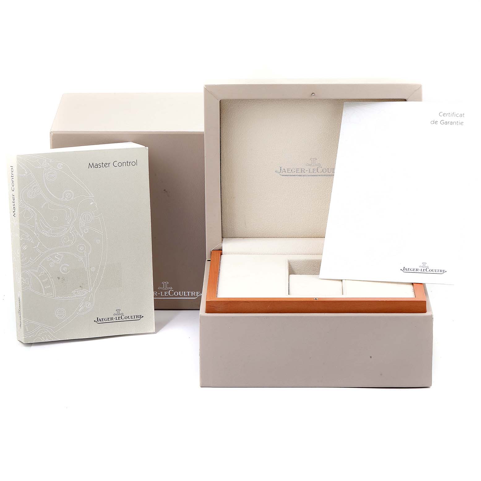 The image shows the packaging box, manual, and warranty card for the Jaeger-LeCoultre Master Control watch.