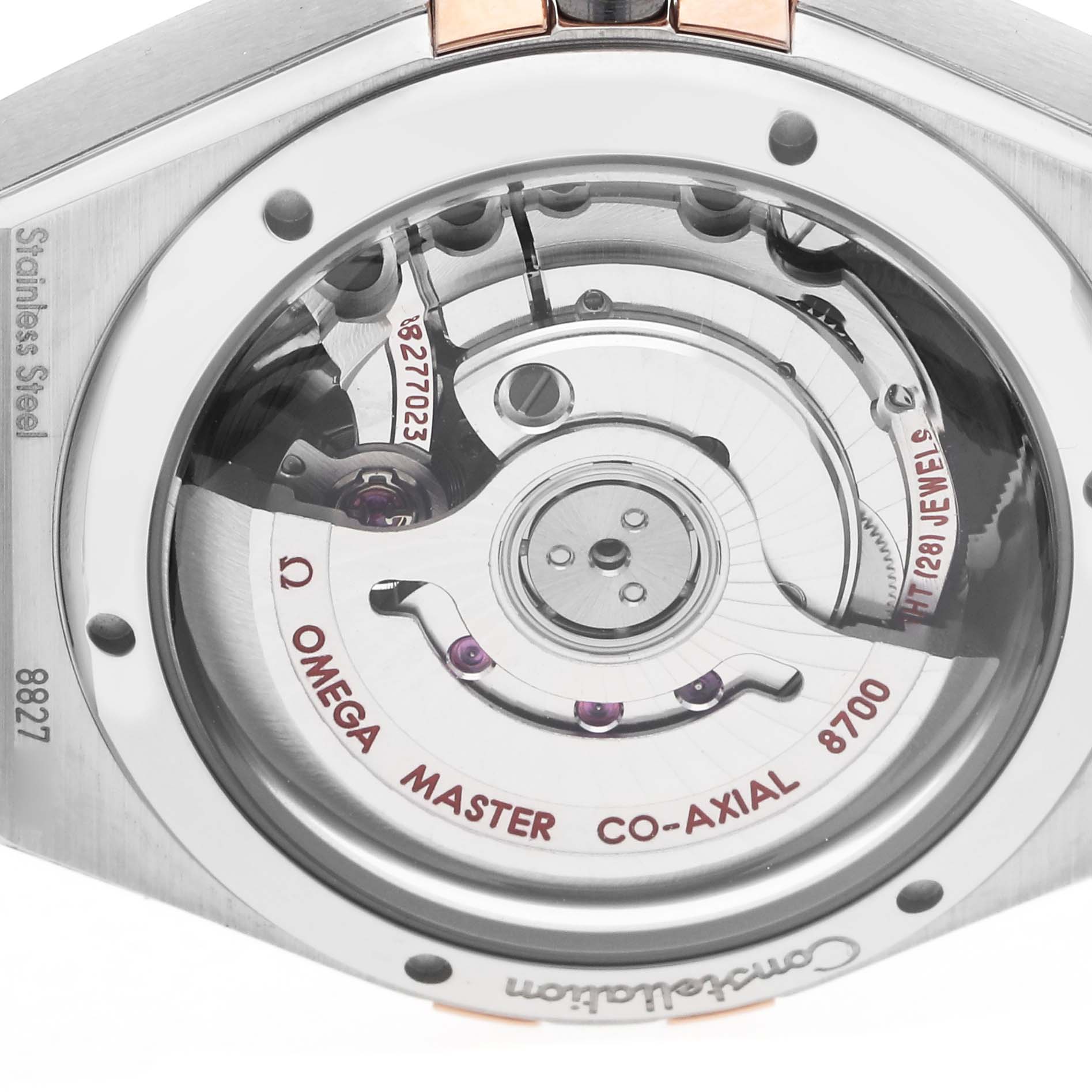 The image shows the back of the Omega 131.25.29.20.52.001 Women's Steel and Gold (two tone) White Dial 131.25.29.20.52.001 Women's Steel and Gold (two tone) White Dial Constellation Diamond Rose Gold Steel Ladies Watch 131.25.29, highlighting its movement.