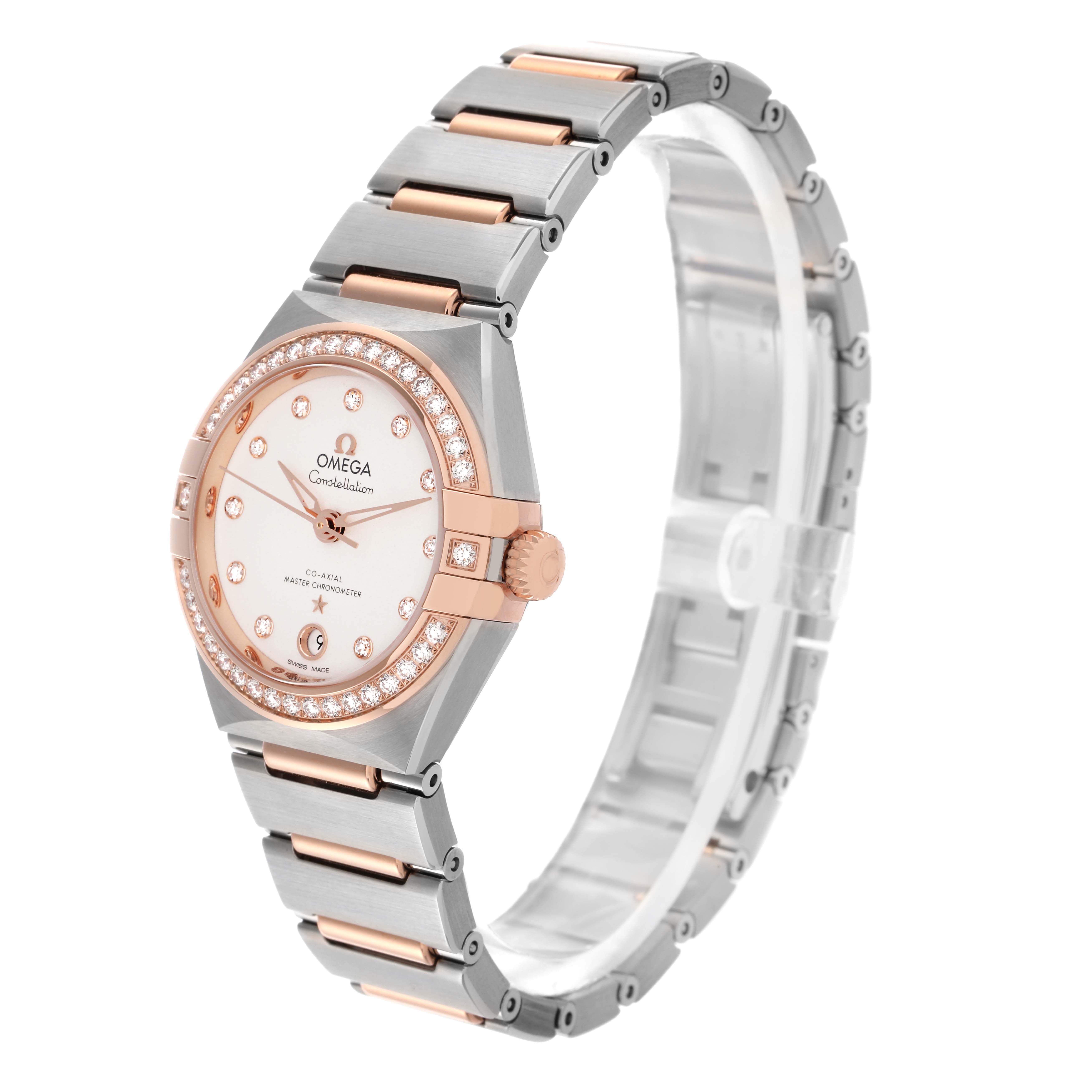 The Omega 131.25.29.20.52.001 Women's Steel and Gold (two tone) White Dial 131.25.29.20.52.001 Women's Steel and Gold (two tone) White Dial Constellation Diamond Rose Gold Steel Ladies Watch 131.25.29 is shown at an angled side view, highlighting the bezel, dial, and bracelet.