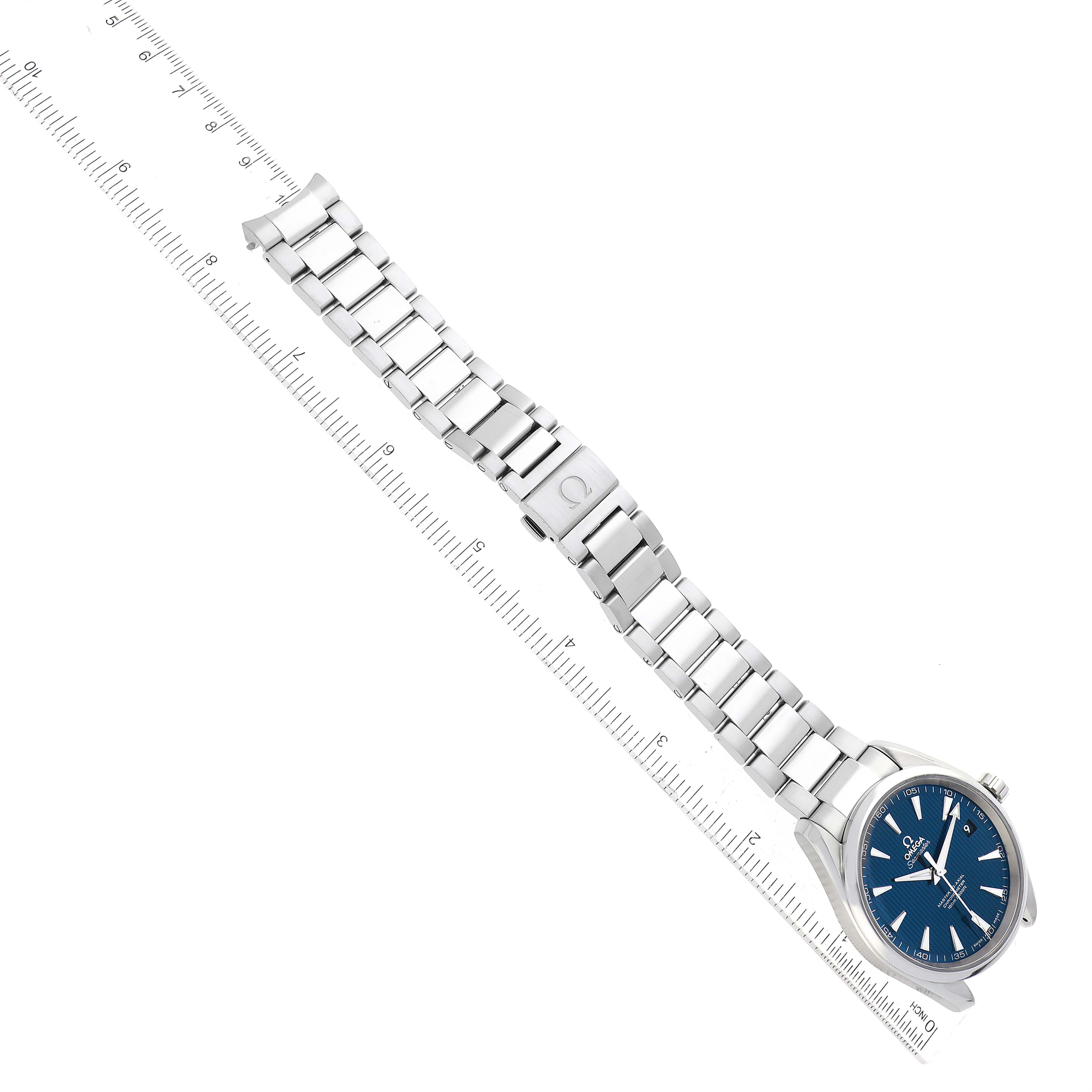 The image shows an Omega Aqua Terra 231.10.42.21.03.001 Men's Stainless Steel Blue Dial 231.10.42.21.03.001 Men's Stainless Steel Blue Dial watch with a blue dial and stainless steel bracelet laid next to a ruler for measurement.