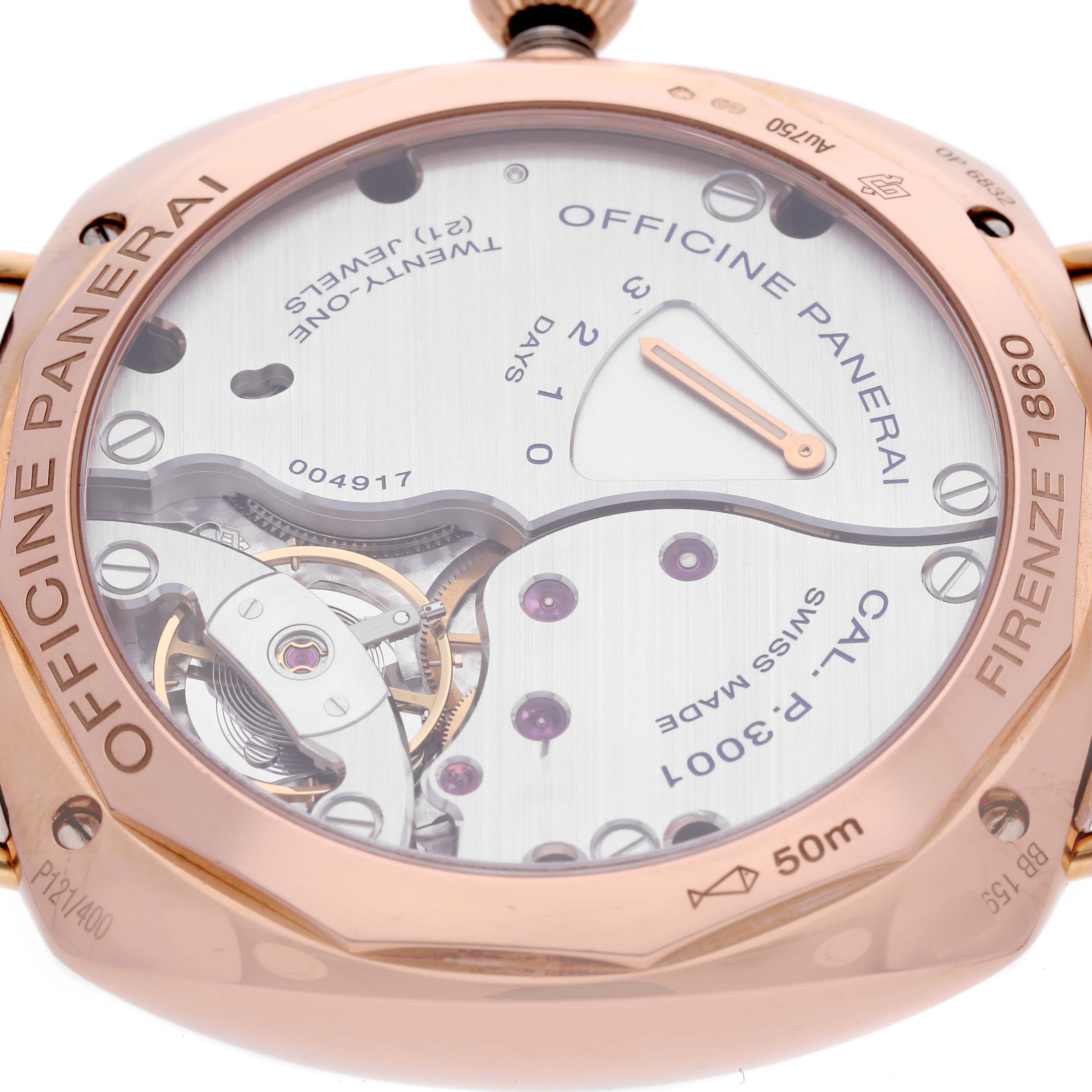 The image shows a close-up of the back of a Panerai Radiomir PAM00570 Men's Rose Gold Brown Dial PAM00570 Men's Rose Gold Brown Dial watch, revealing its movement and inner mechanisms.