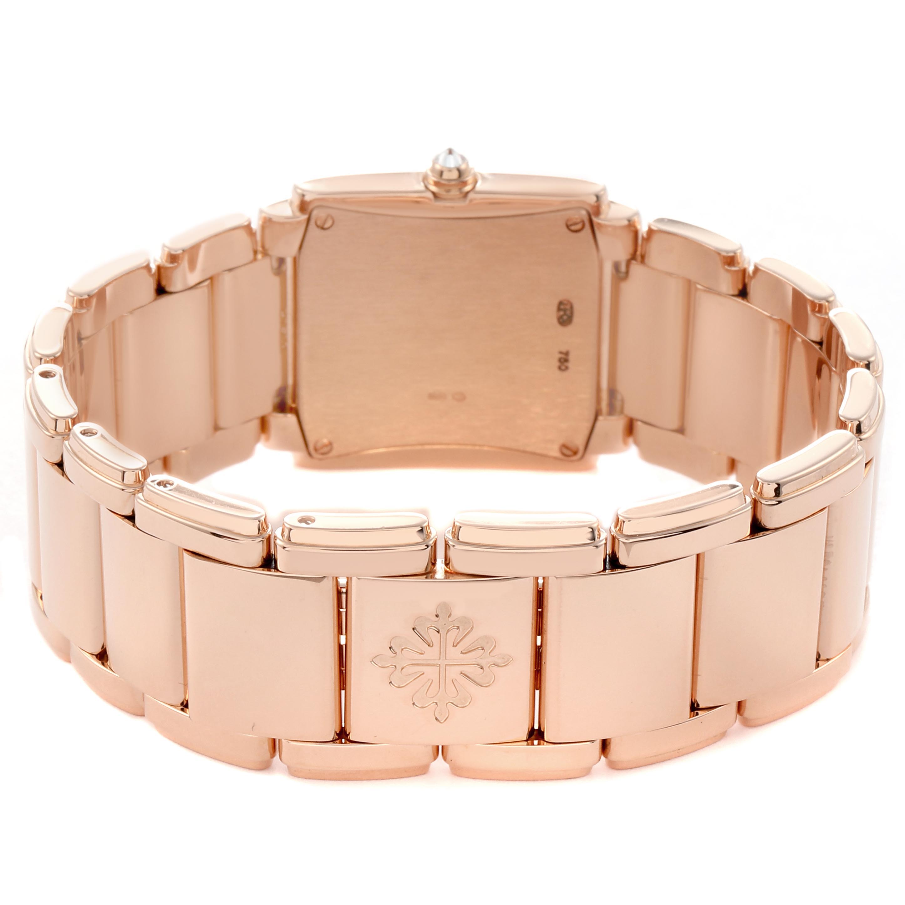 The image shows the back of the bracelet and case of a Patek Philippe Twenty-4 4910R Women's Rose Gold Brown Dial 4910R Women's Rose Gold Brown Dial watch, highlighting its rose gold links and clasp.