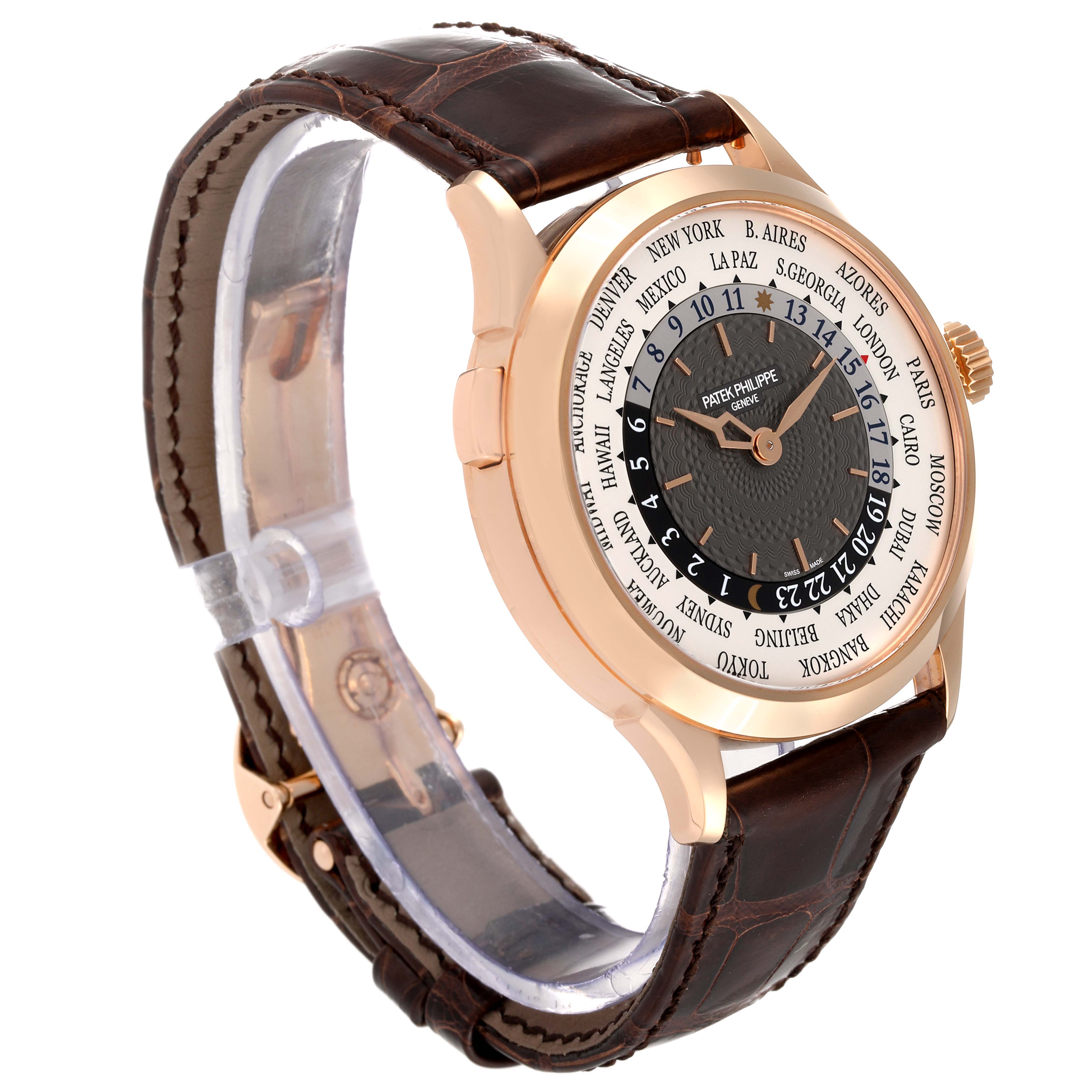 The Patek Philippe Complications 5230R Men's Rose Gold Grey Dial 5230R Men's Rose Gold Grey Dial watch is shown at a slight angle, highlighting its face, bezel, crown, and leather strap.