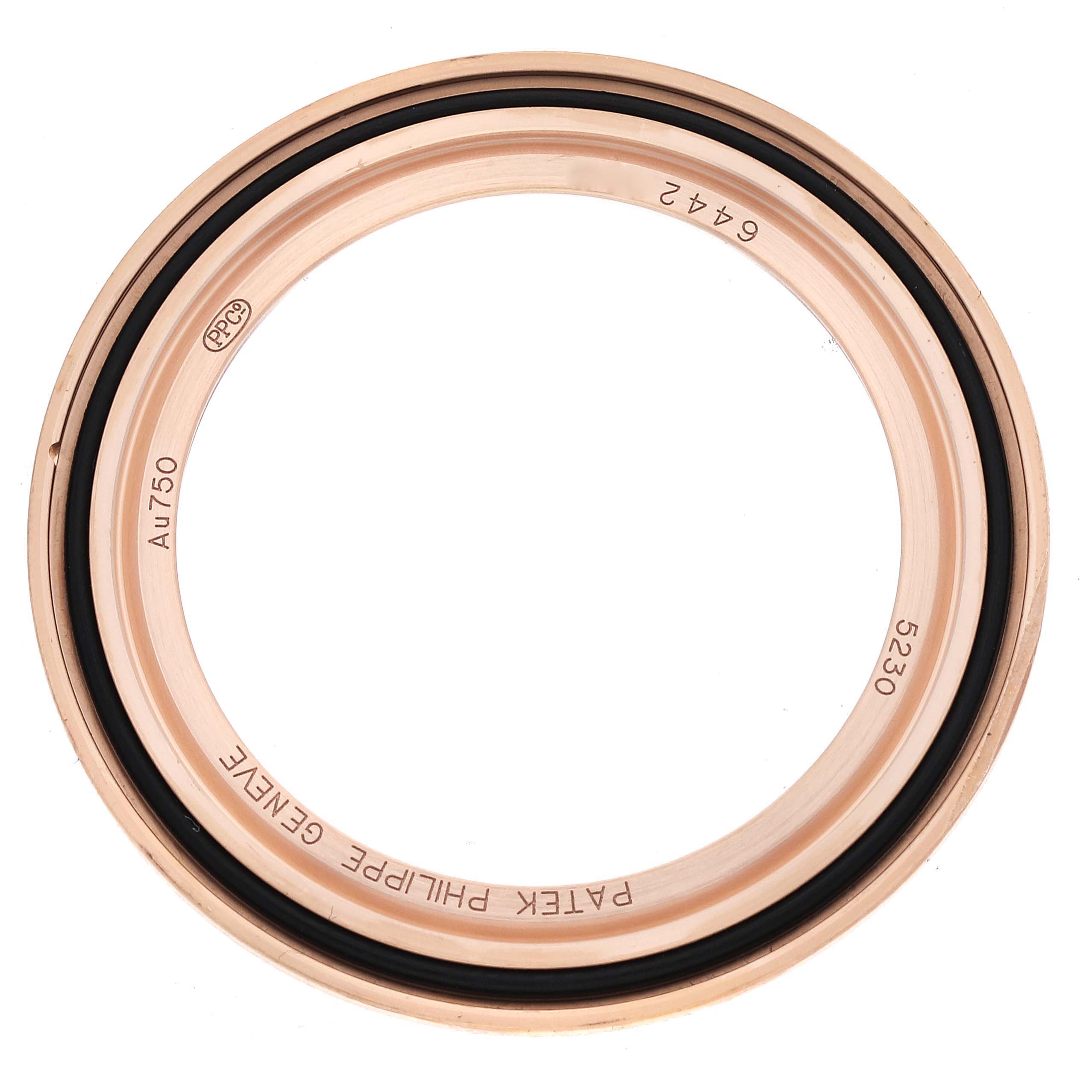 The image shows a close-up of the Patek Philippe Complications 5230R Men's Rose Gold Grey Dial 5230R Men's Rose Gold Grey Dial model 5230 watch bezel with engraved details.