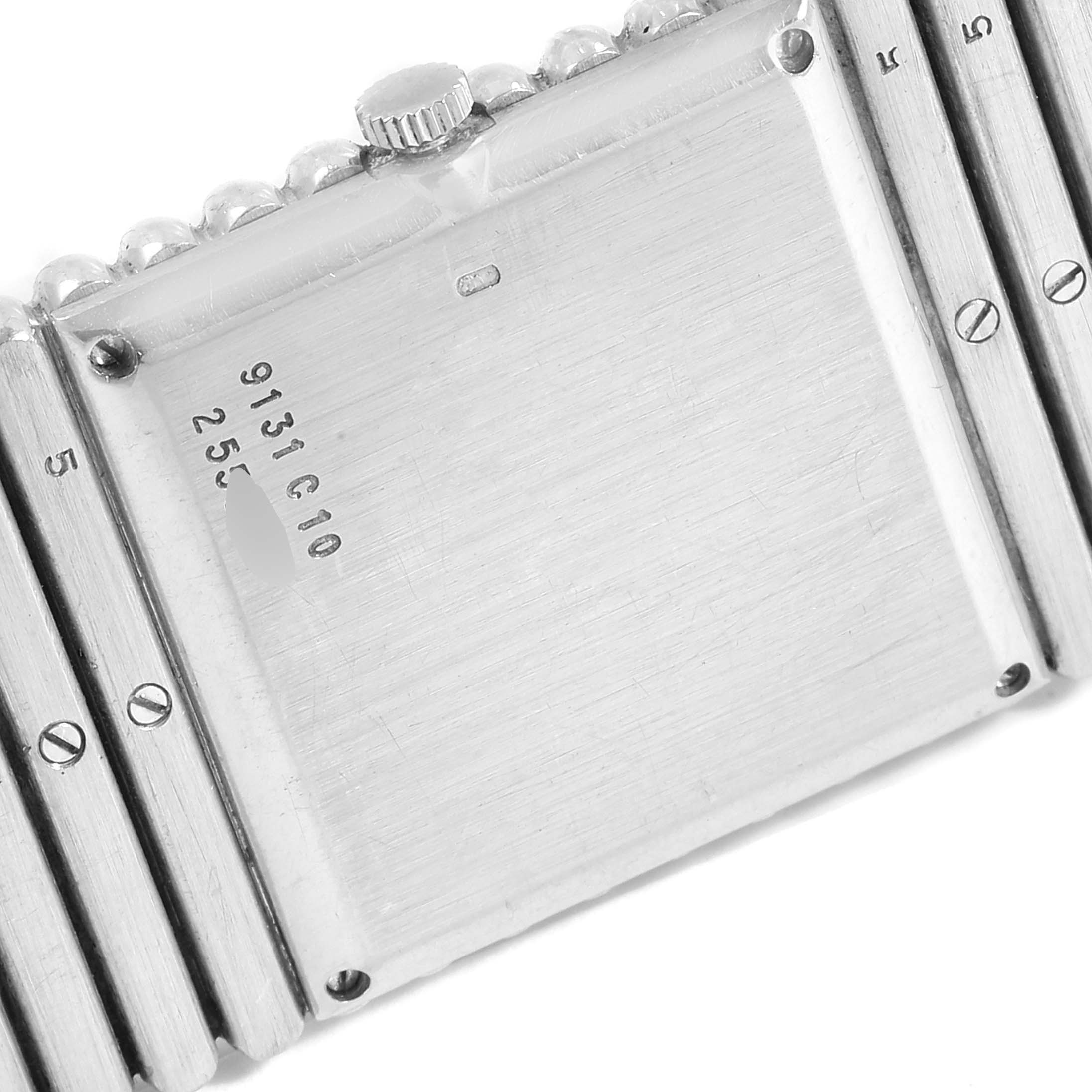 This image shows the back case and part of the bracelet of the Piaget 9131 C 10 Men
s White Gold Black Dial 9131 C 10 Men
s White Gold Black Dial Polo 18K White Gold Black Dial Mens Watch 9131 model.