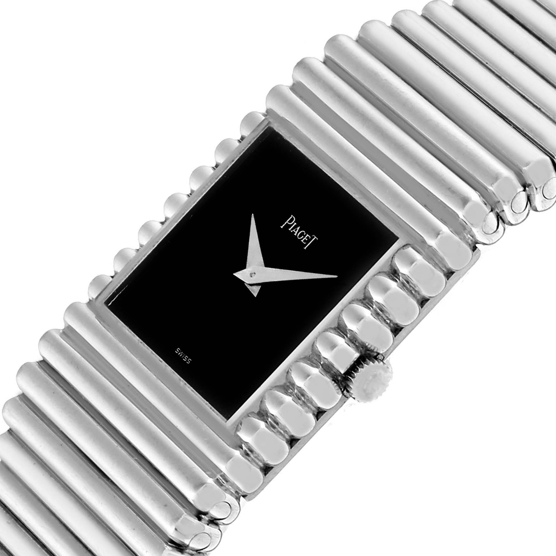 The image shows a close-up view of the face and bracelet of a Piaget 9131 C 10 Men
s White Gold Black Dial 9131 C 10 Men
s White Gold Black Dial Polo 18K White Gold Black Dial Men
s Watch 9131 model.