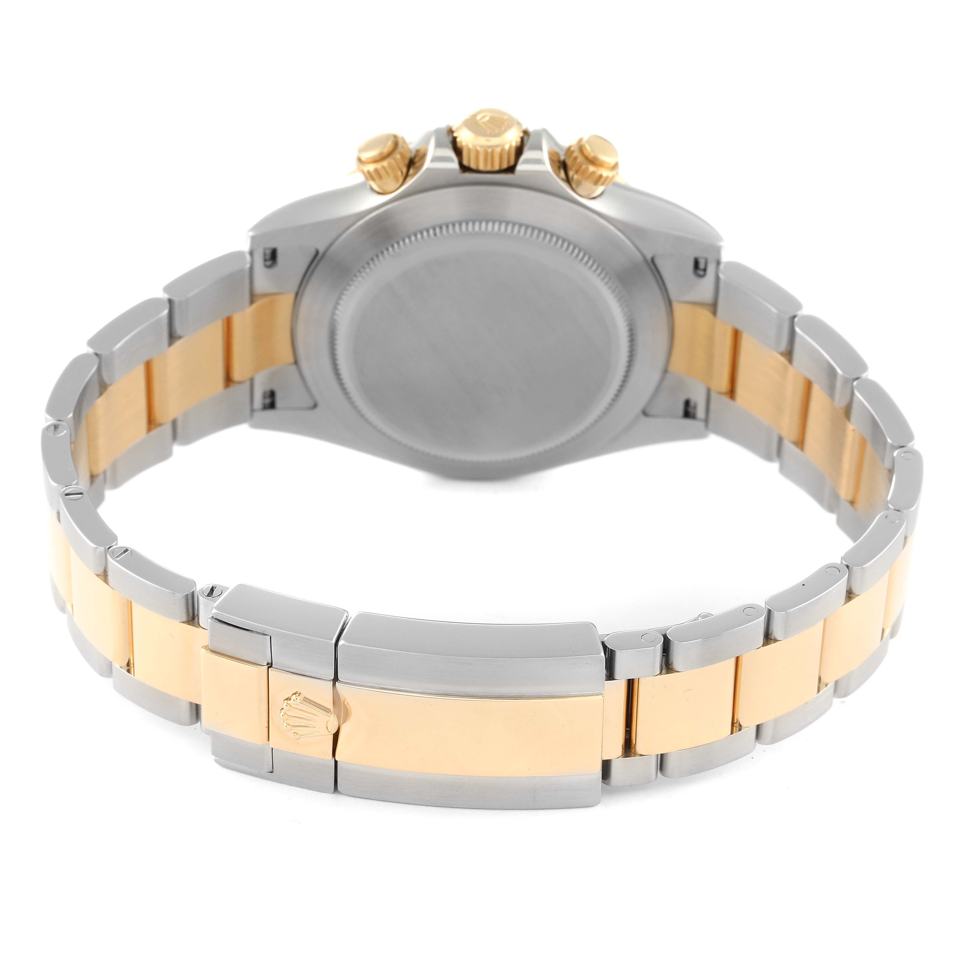 This image shows the back of a Rolex Daytona 116503 Men
s Steel and Gold (two tone) White Dial 116503 Men
s Steel and Gold (two tone) White Dial watch, highlighting the clasp and bracelet in a two-tone design.