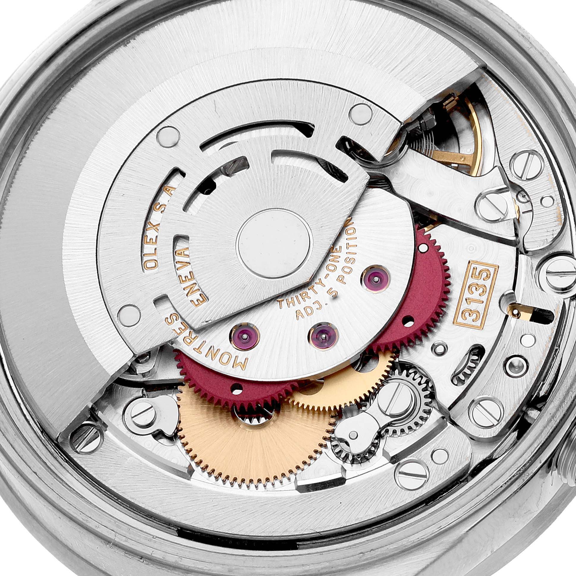 This is a close-up shot of the movement inside a Rolex Date 15210 Men
s Stainless Steel Pink Dial 15210 Men
s Stainless Steel Pink Dial model watch, showcasing its intricate gears and components.