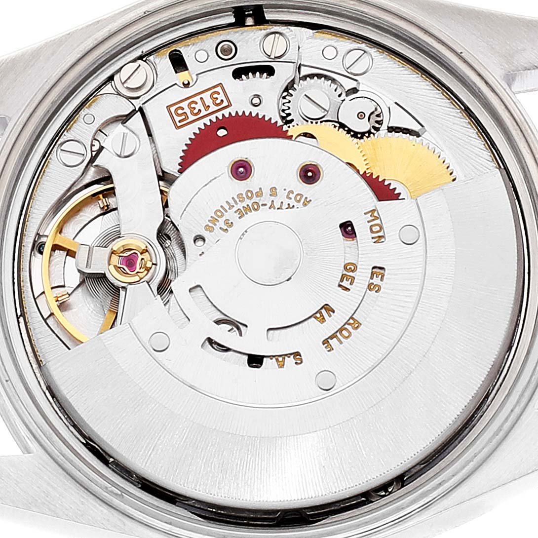 This image shows the movement and inner mechanical parts of a Rolex Date 15200 Men's Stainless Steel White Dial 15200 Men's Stainless Steel White Dial model watch from a caseback view.
