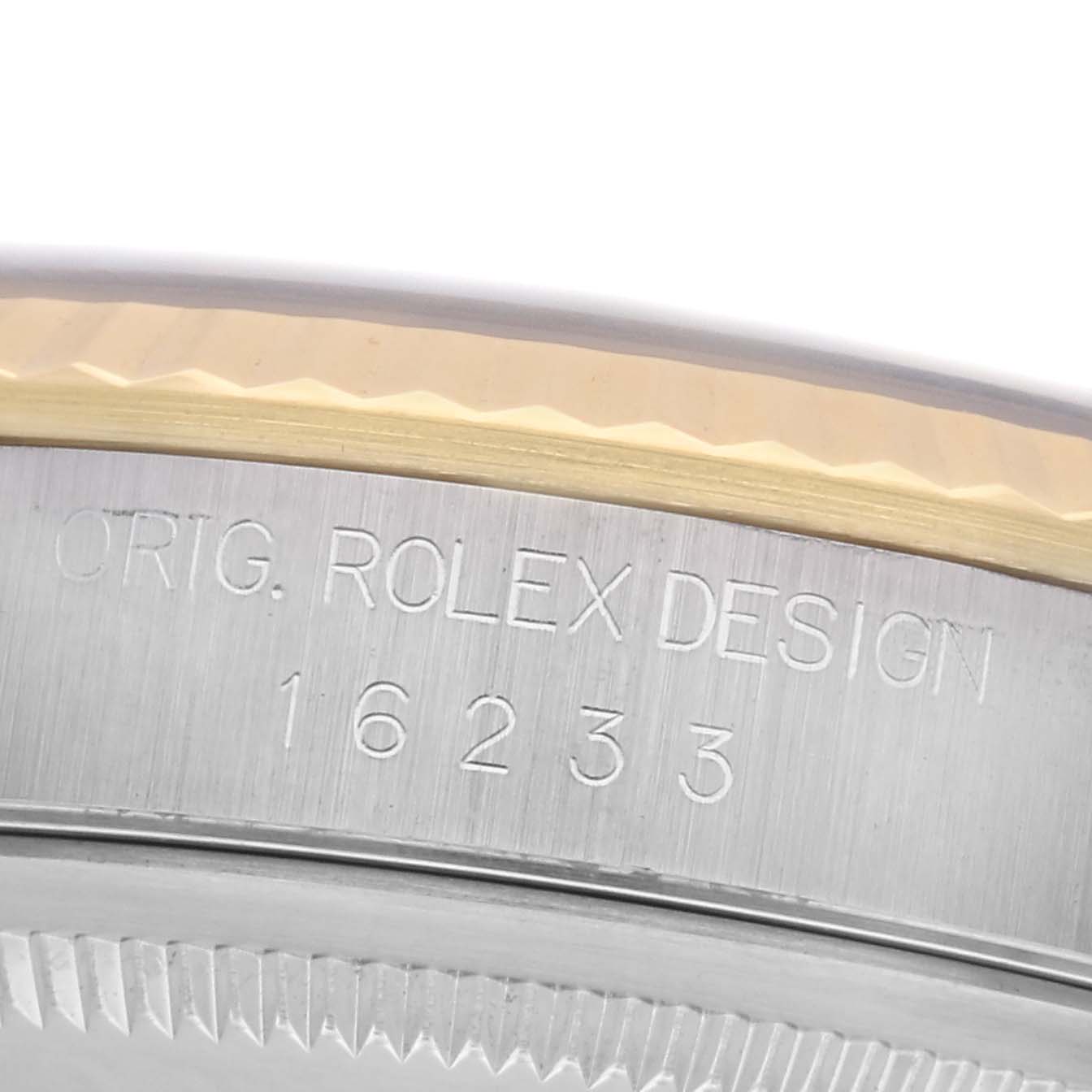 The image shows a close-up of the case side of a Rolex Datejust 16233 Men's Steel and Gold (two tone) Black Dial 16233 Men's Steel and Gold (two tone) Black Dial, highlighting the model number engraving.