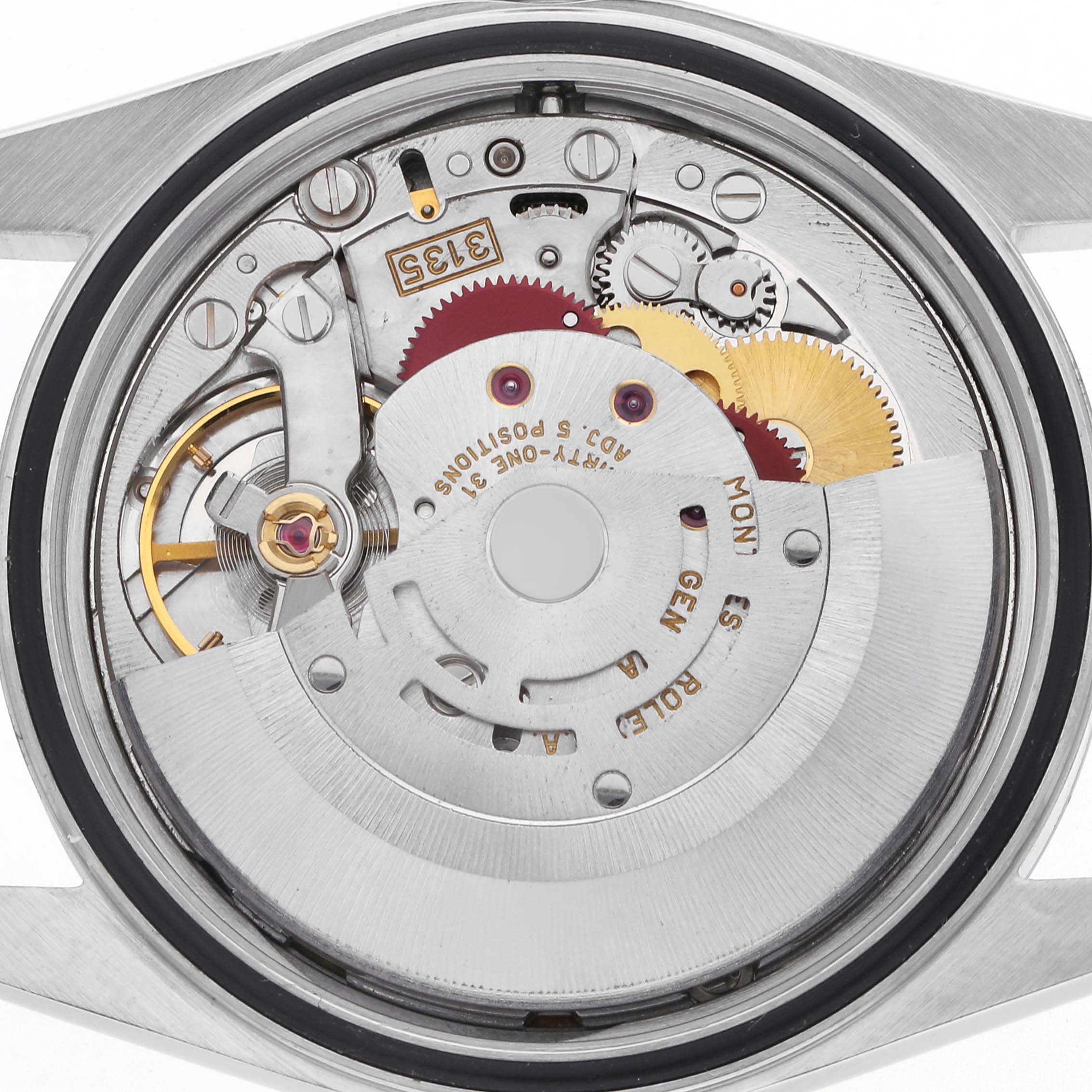 The image shows the movement of a Rolex Datejust 16233 Men's Steel and Gold (two tone) Blue Dial 16233 Men's Steel and Gold (two tone) Blue Dial watch from a top-down angle, revealing gears and mechanical components.