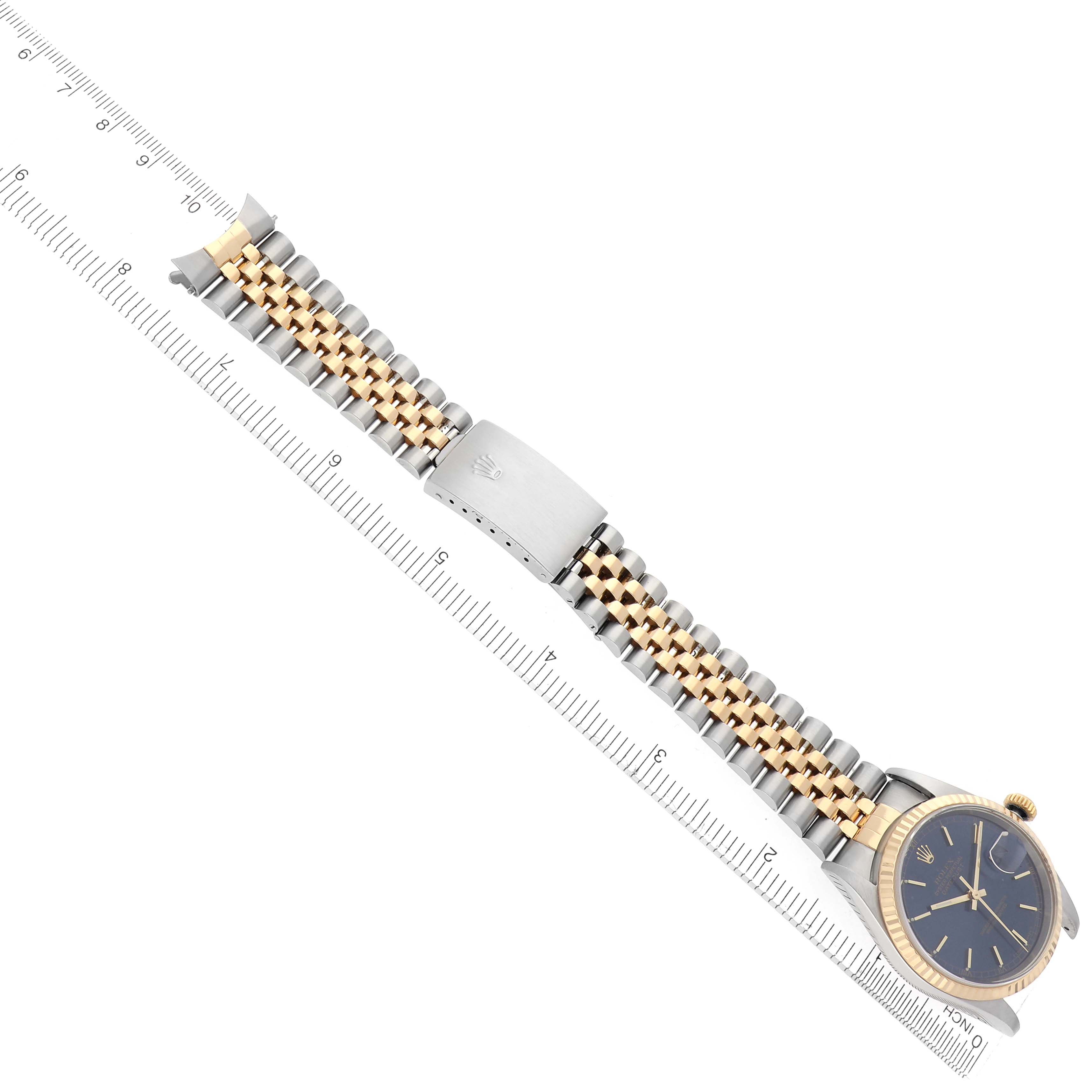 The Rolex Datejust 16233 Men's Steel and Gold (two tone) Blue Dial 16233 Men's Steel and Gold (two tone) Blue Dial watch is shown from a top view, highlighting the face, bracelet, and clasp.