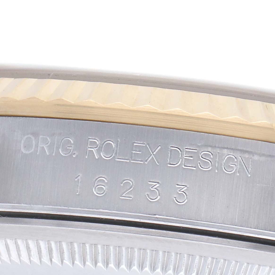 The image shows a close-up of the side case of a Rolex Datejust 16233 Men's Steel and Gold (two tone) Blue Dial 16233 Men's Steel and Gold (two tone) Blue Dial, displaying the model number and "ORIG. ROLEX DESIGN."