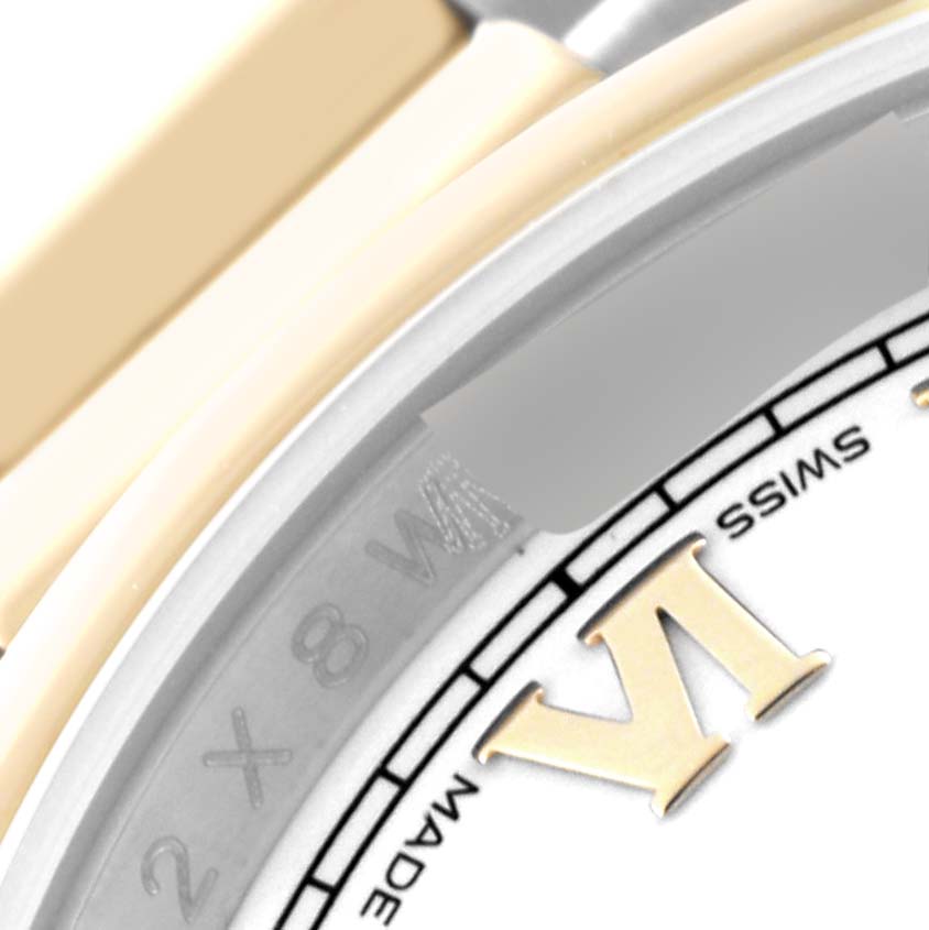 The image shows a close-up of the dial and part of the bezel of a Rolex Datejust 116203 Men's Steel and Gold (two tone) White Dial 116203 Men's Steel and Gold (two tone) White Dial watch, highlighting the Roman numeral VI and the “SWISS MADE” marking.