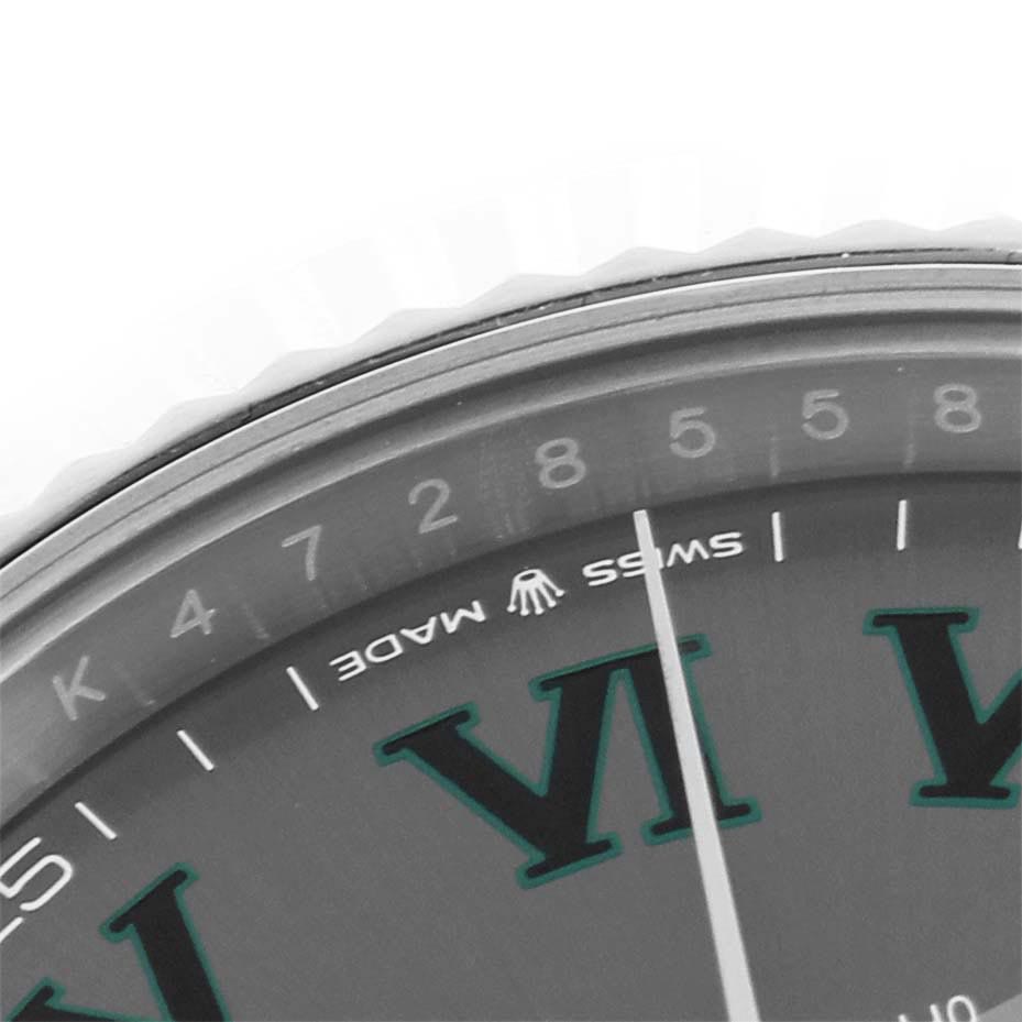 The image shows a close-up of the Rolex Datejust 41 126334 Men's Stainless Steel Grey Dial 126334 Men's Stainless Steel Grey Dial's dial, focusing on the numerals, indices, and part of the bezel.