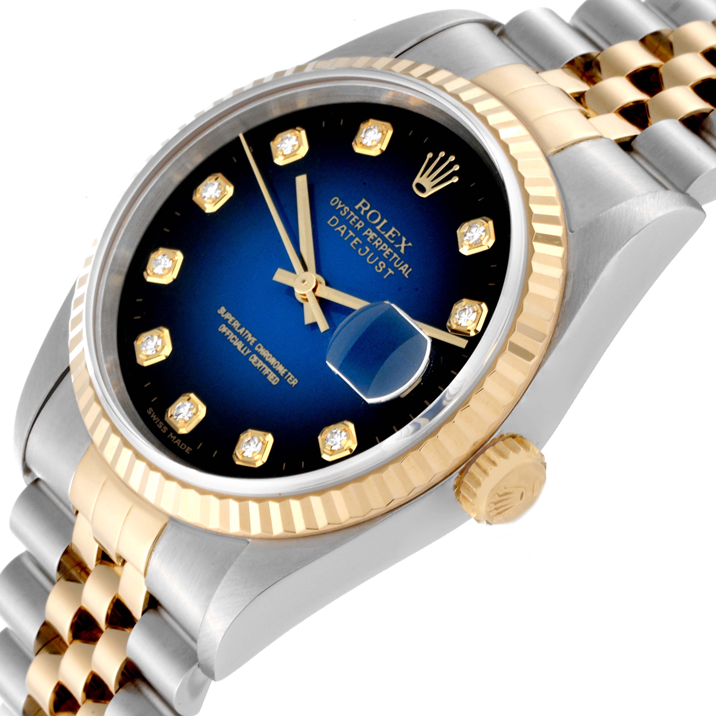 The image shows a close-up, front-left angle of the Rolex Datejust 16233 Men's Steel and Gold (two tone) Blue Dial 16233 Men's Steel and Gold (two tone) Blue Dial watch, highlighting its dial, bezel, crown, and part of the bracelet.
