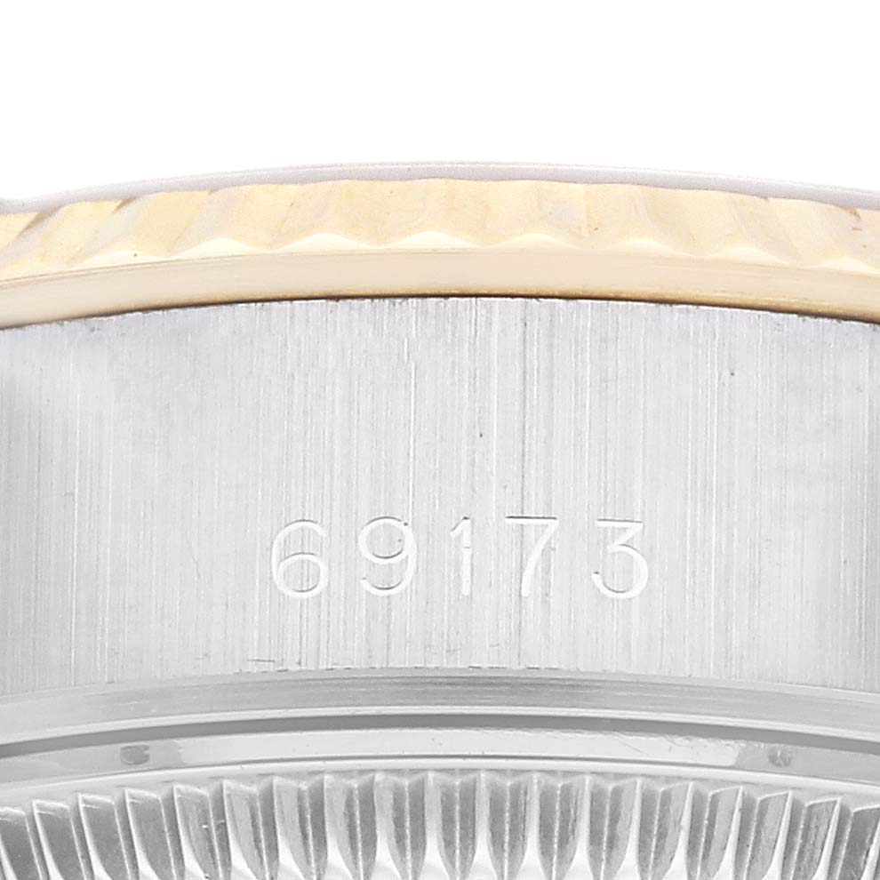 This image shows a close-up of the case side and bezel of a Rolex Datejust 69173 Women's Steel and Gold (two tone) Champagne Dial 69173 Women's Steel and Gold (two tone) Champagne Dial model, displaying the reference number 69173.