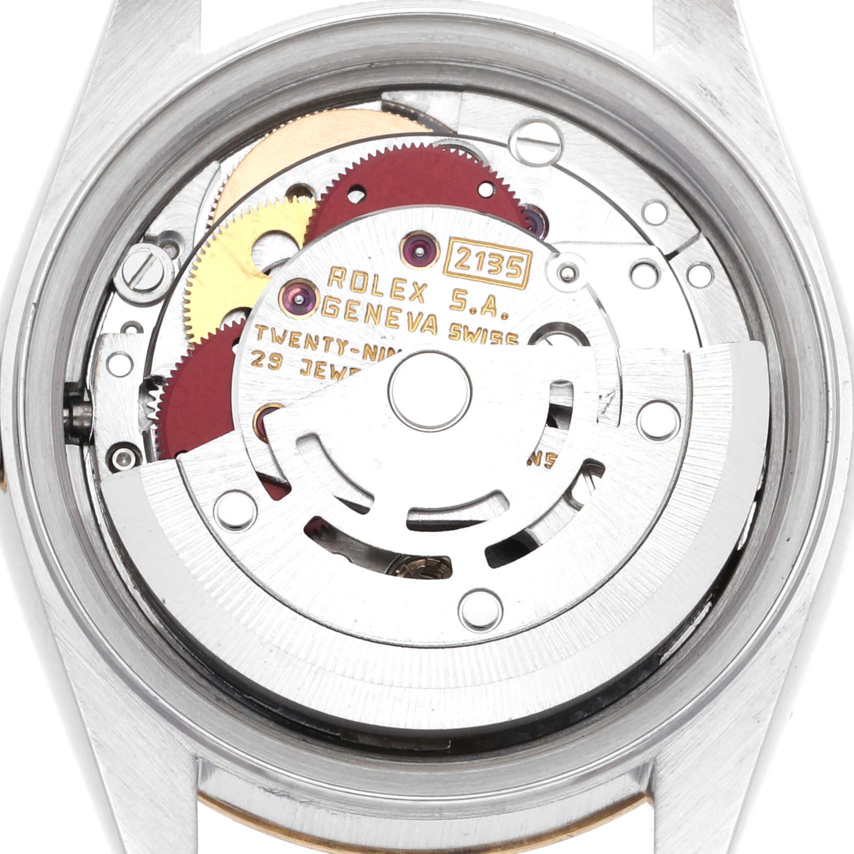 The image shows the back view of the Rolex Datejust 69173 Women's Steel and Gold (two tone) Champagne Dial 69173 Women's Steel and Gold (two tone) Champagne Dial watch, focusing on its intricate mechanical movement.