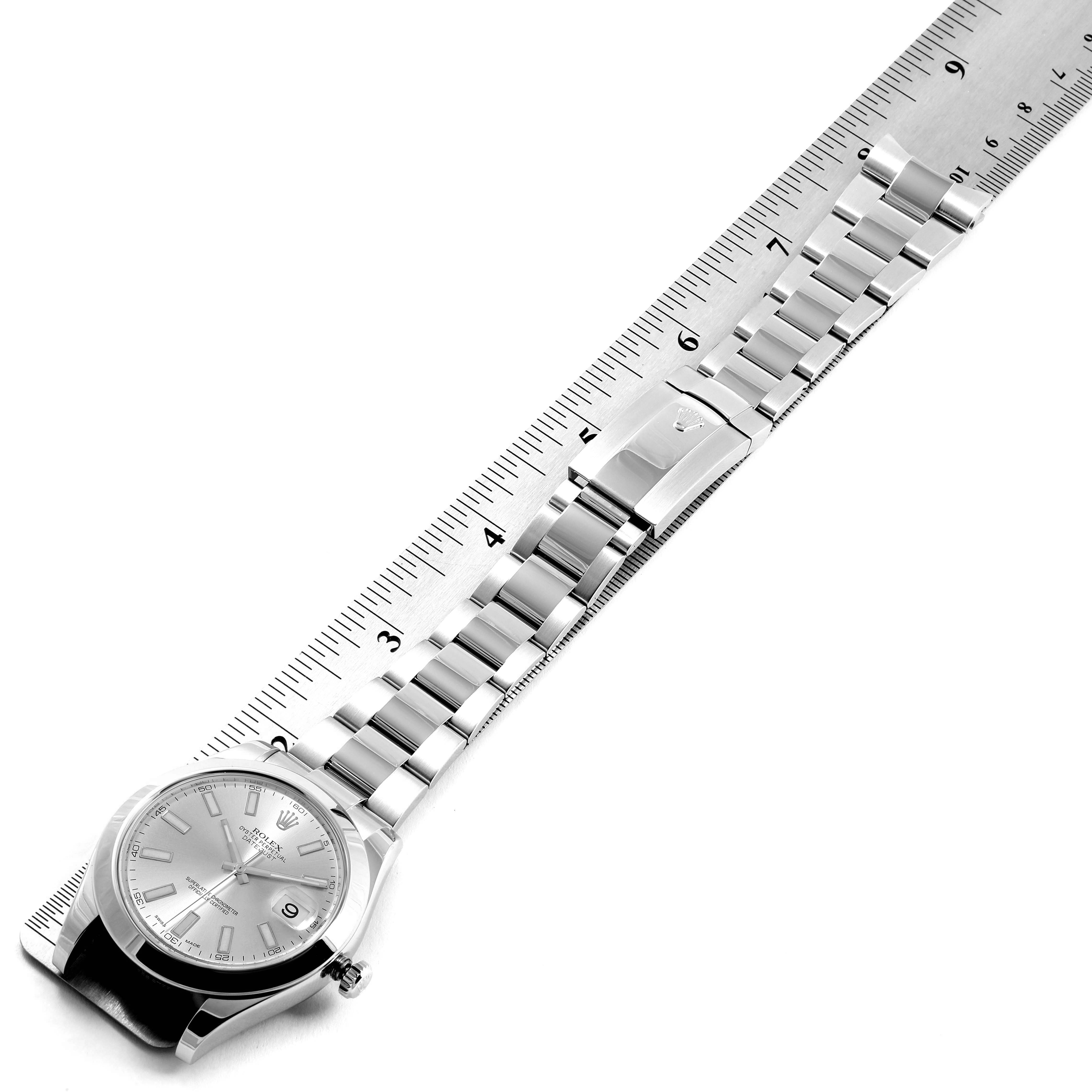 The image shows a top-down view of the Rolex Datejust 41 116300 Men's Stainless Steel Silver Dial 116300 Men's Stainless Steel Silver Dial watch placed beside a ruler, highlighting the bracelet size.