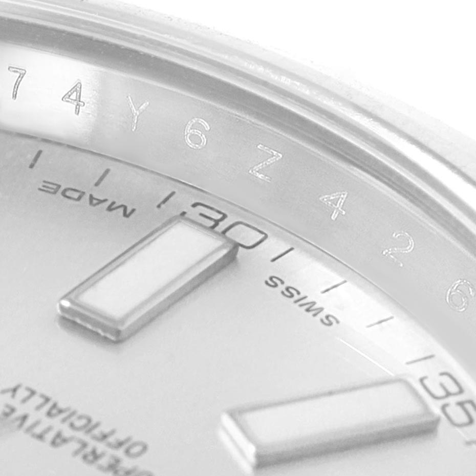 The image shows a close-up view of the dial and the bezel of a Rolex Datejust 41 116300 Men's Stainless Steel Silver Dial 116300 Men's Stainless Steel Silver Dial, highlighting the markers and inscriptions.