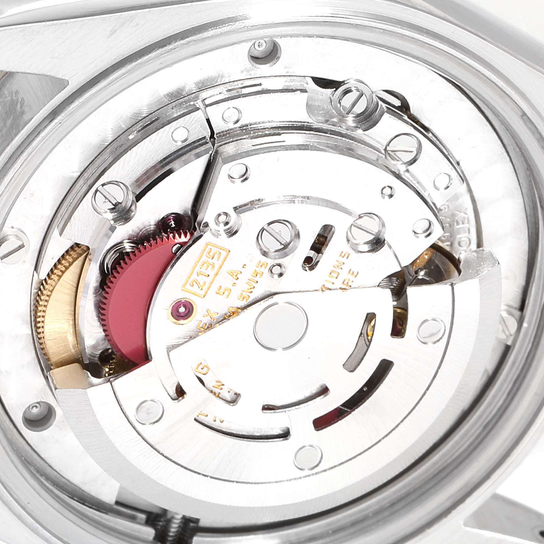 This image shows the internal movement and mechanism of a Rolex Mid-Size 68273 Women
s Steel and Gold (two tone) White Dial 68273 Women
s Steel and Gold (two tone) White Dial model watch from a close-up angle.