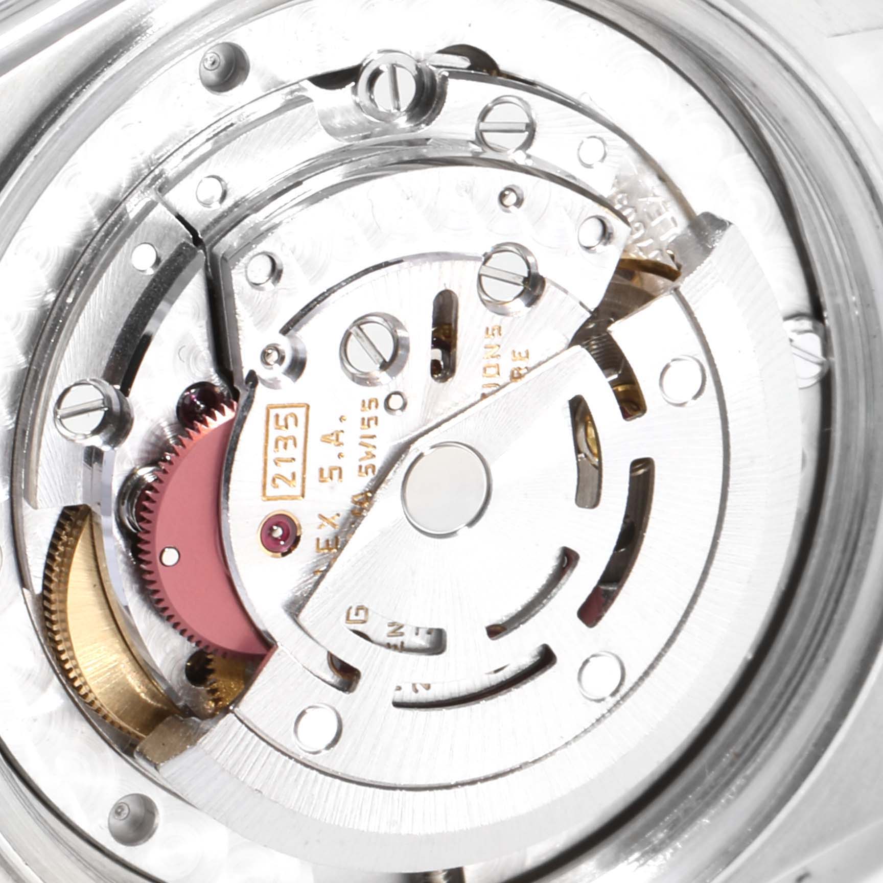 This image shows the internal movement mechanism of a Rolex Mid-Size 68273 Women
s Steel and Gold (two tone) White Dial 68273 Women
s Steel and Gold (two tone) White Dial model watch, viewed from the back.