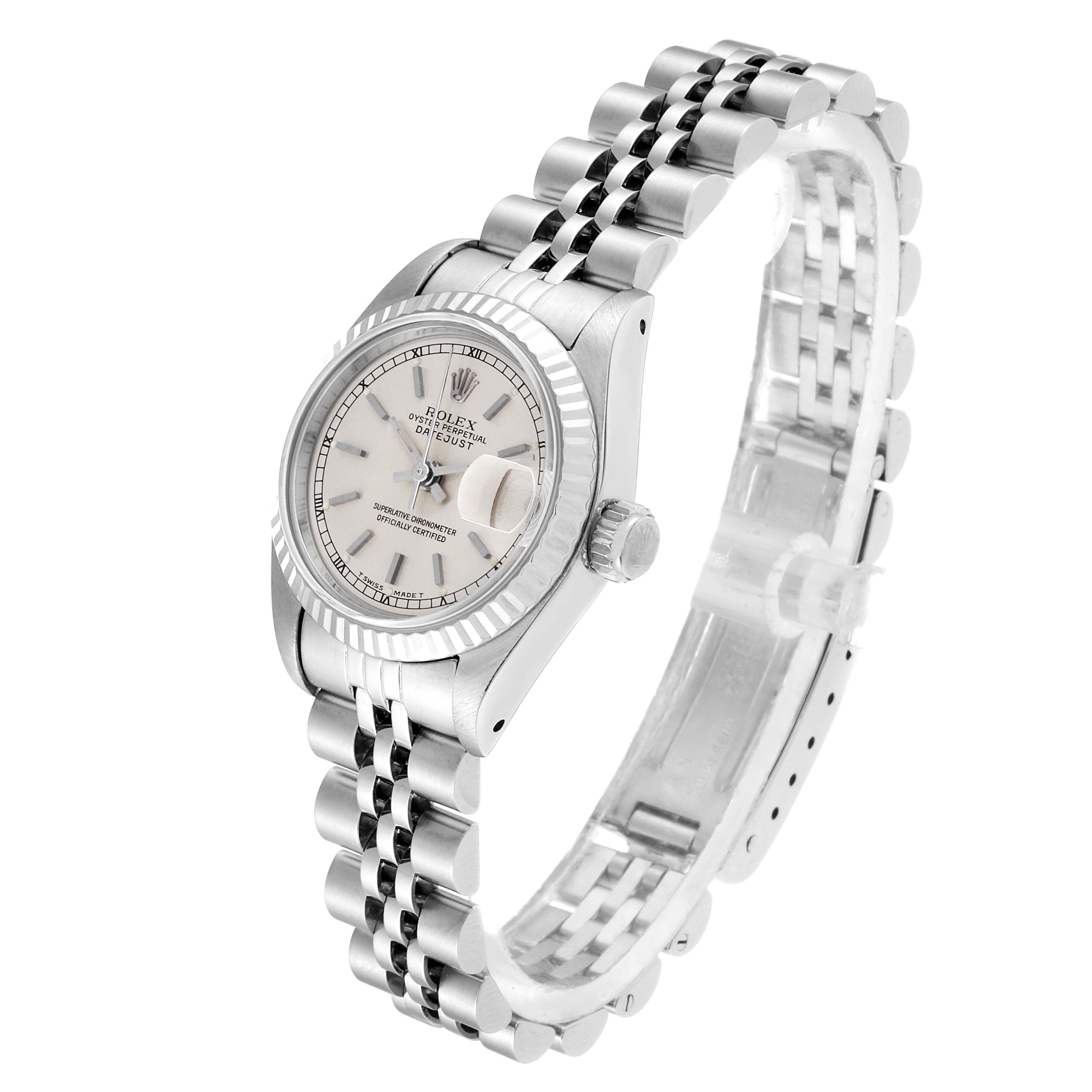 This image shows a Rolex Datejust 69174 Women's Stainless Steel Silver Dial 69174 Women's Stainless Steel Silver Dial watch at an angled side view, highlighting the dial, bezel, and Jubilee bracelet.