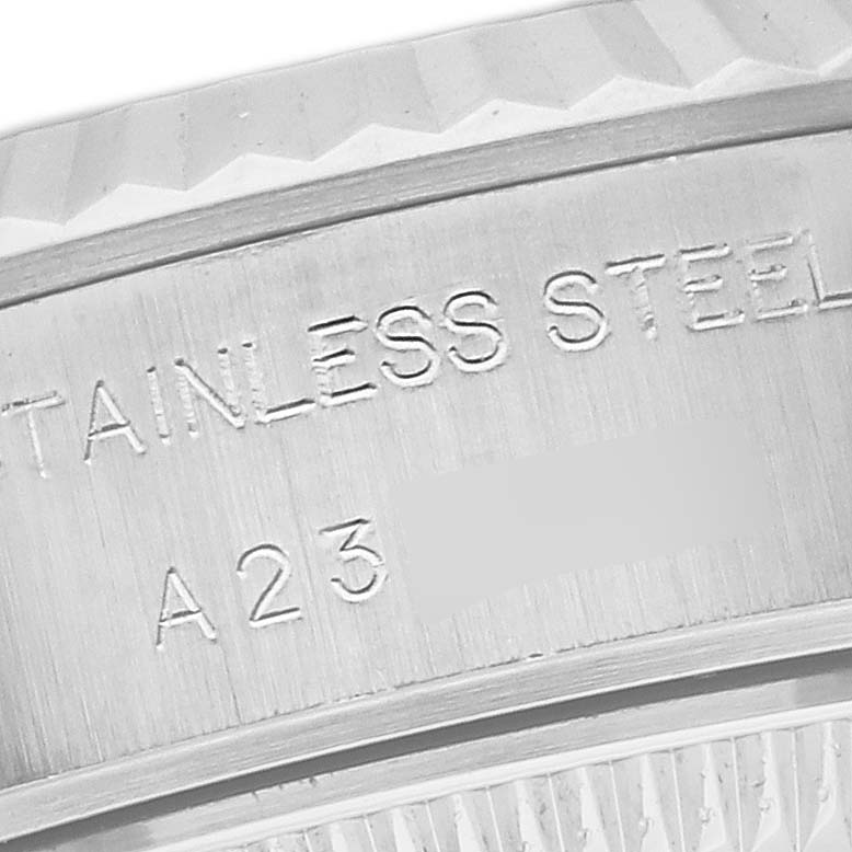 This image shows a close-up of the stainless steel engraving on the case back of a Rolex Datejust 79174 Women's Stainless Steel Silver Dial 79174 Women's Stainless Steel Silver Dial watch.