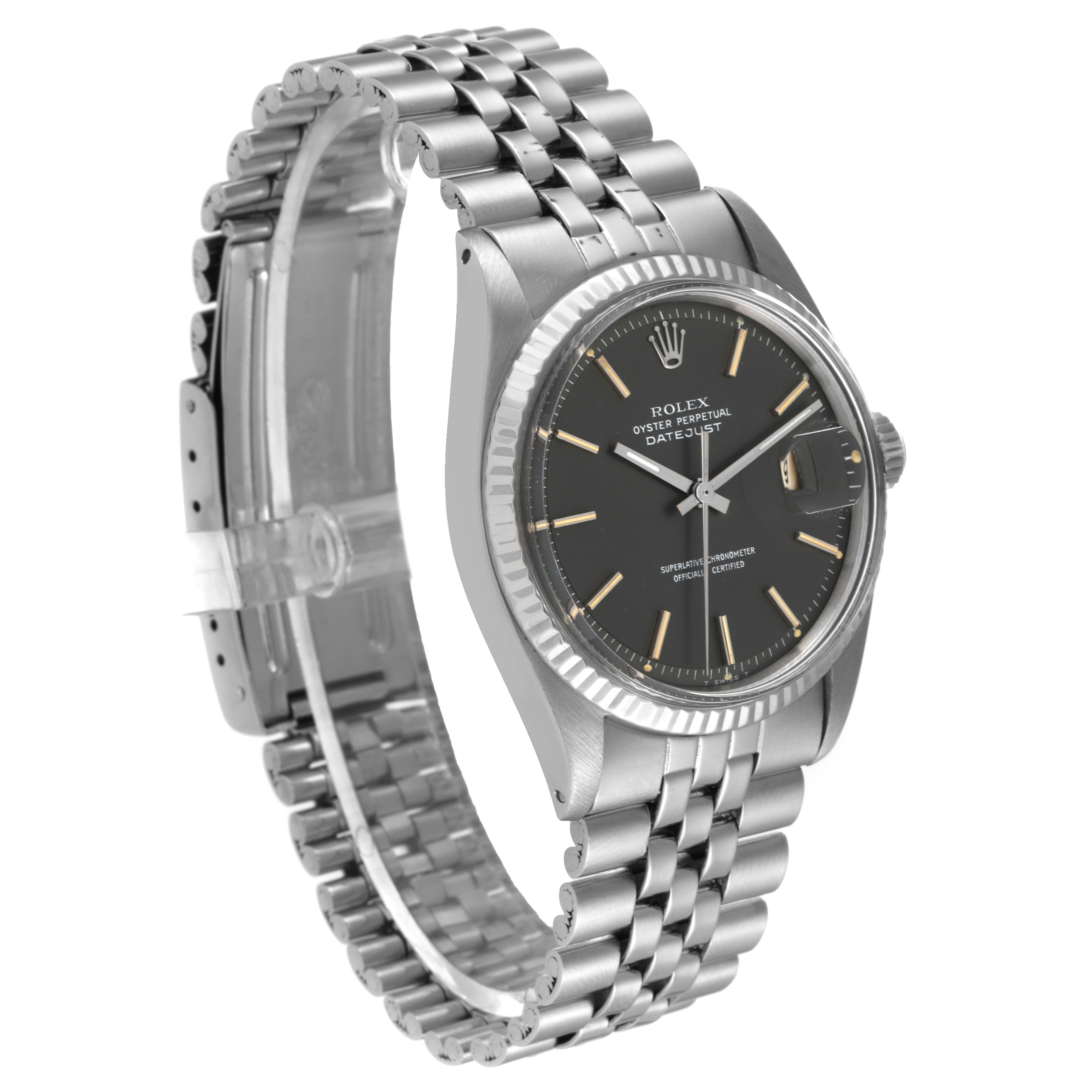 This image shows a side angle view of the Rolex Vintage Collection 1601 Men's Stainless Steel Grey Dial 1601 Men's Stainless Steel Grey Dial watch, highlighting its face, bezel, and bracelet.