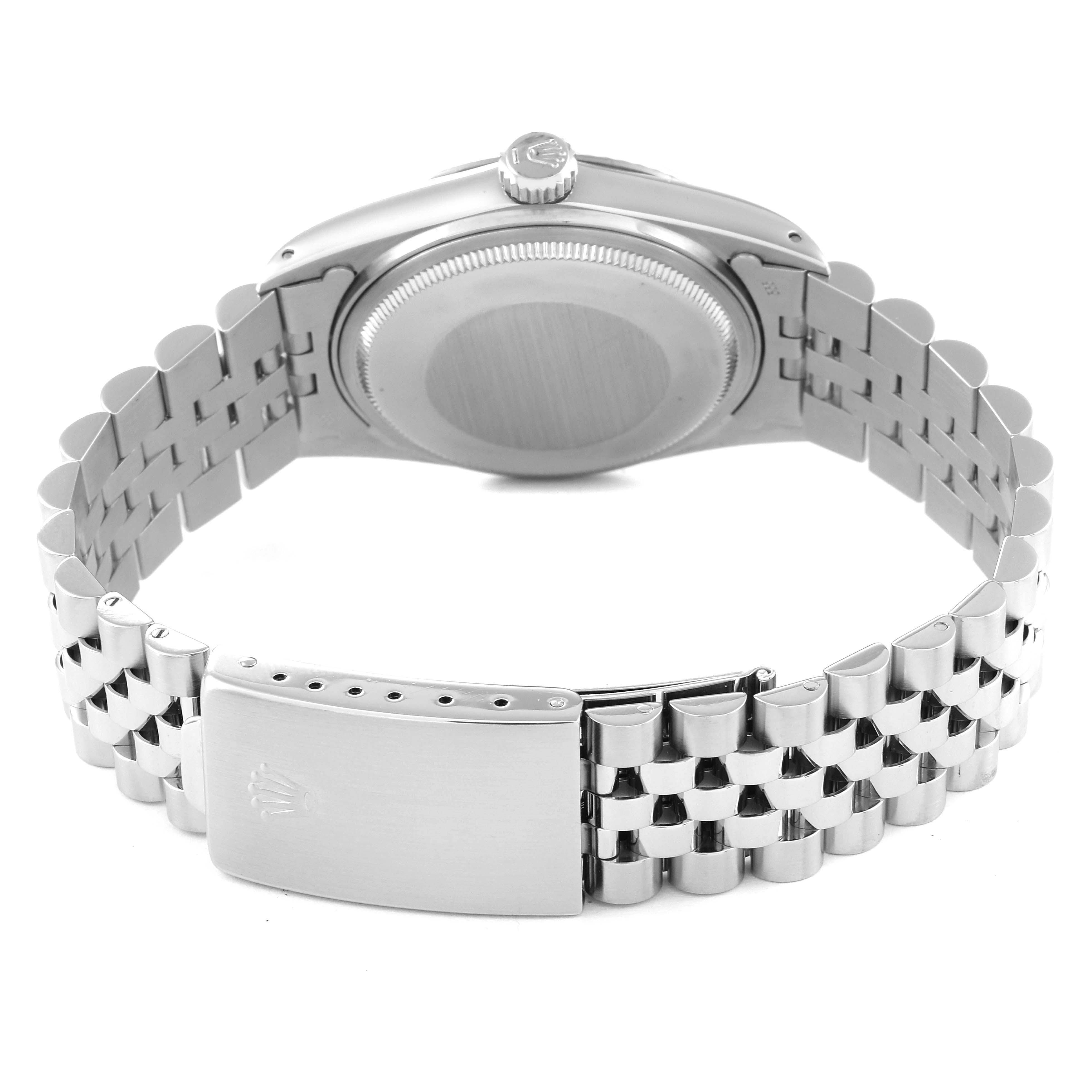 The image shows the back view of a Rolex Vintage Collection 16014 Men's Stainless Steel Silver Dial 16014 Men's Stainless Steel Silver Dial watch, highlighting the case back and bracelet clasp.