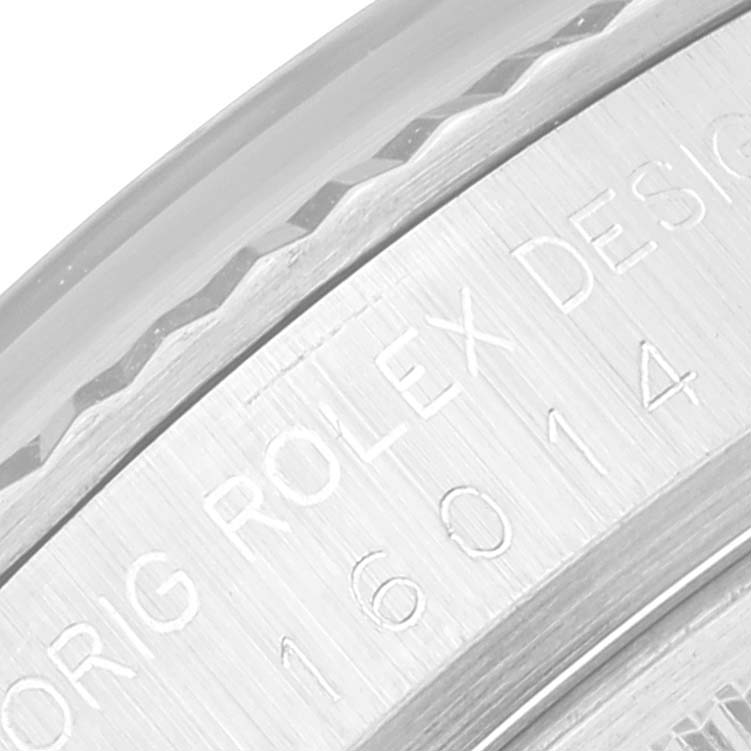 This close-up shows the side engraving of a Vintage Collection Rolex watch, focusing on the model number and design details.