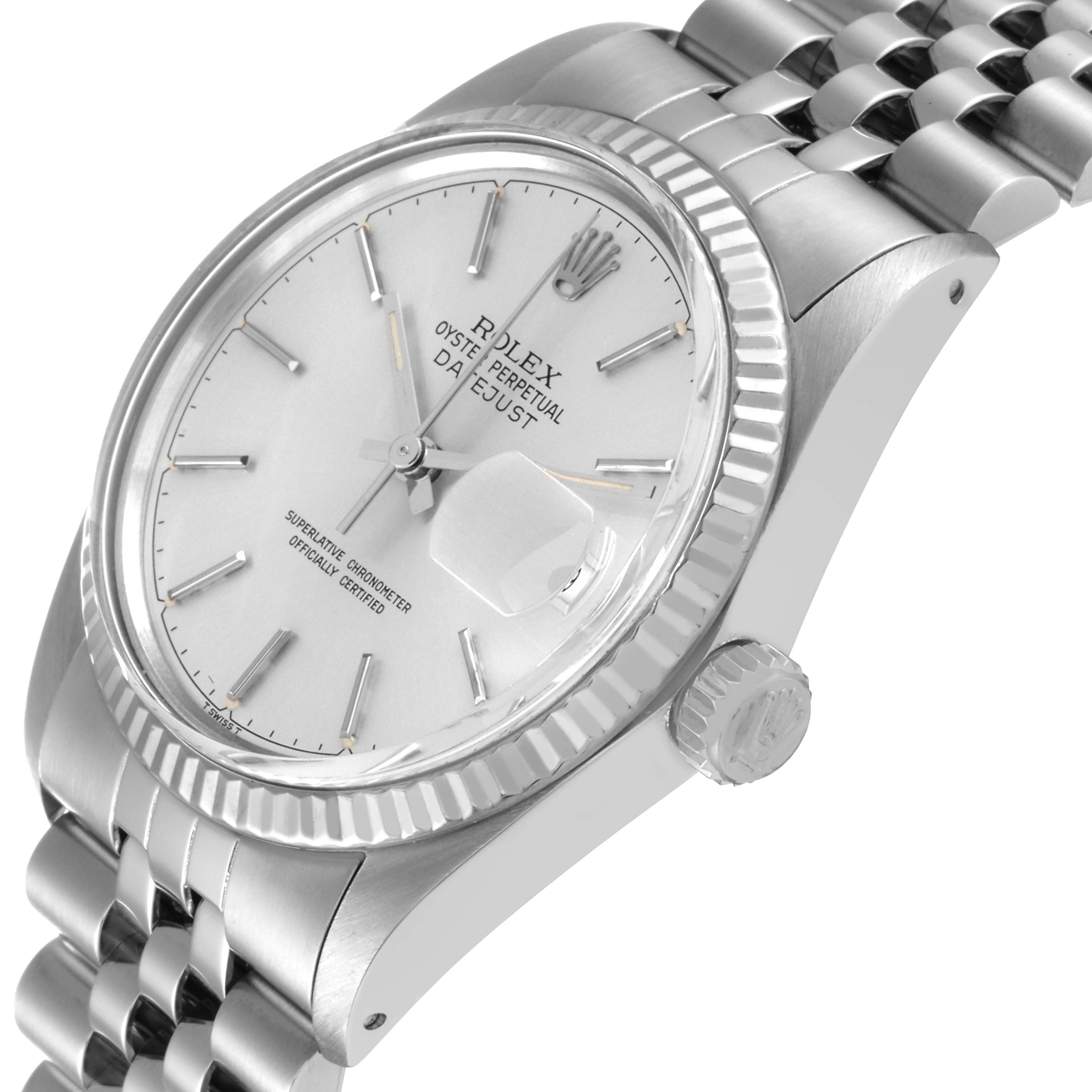 This image shows a side perspective of a Rolex Vintage Collection 16014 Men's Stainless Steel Silver Dial 16014 Men's Stainless Steel Silver Dial Oyster Perpetual Datejust watch, highlighting its face, bezel, crown, and bracelet.