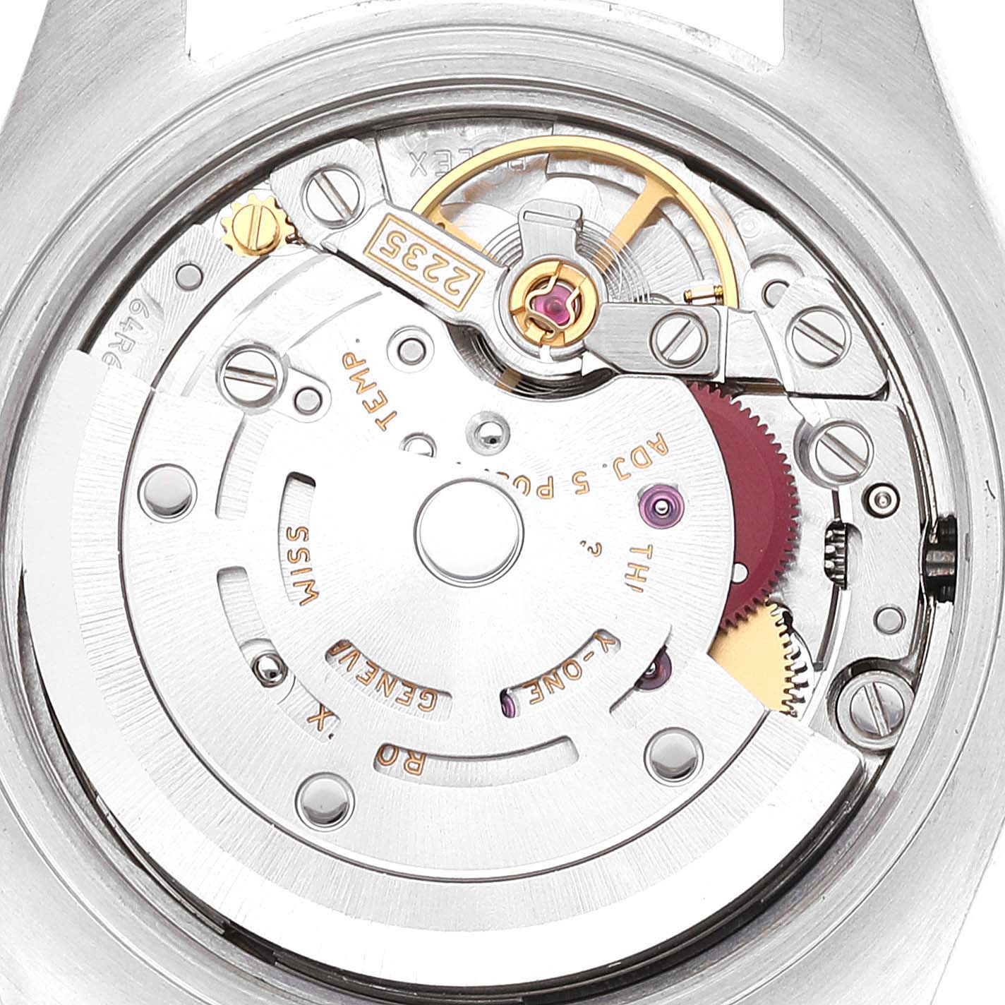 This image shows the intricate movement mechanisms of a Rolex Datejust 179173 Women's Steel and Gold (two tone) Blue Dial 179173 Women's Steel and Gold (two tone) Blue Dial watch from the back, highlighting the internal components.