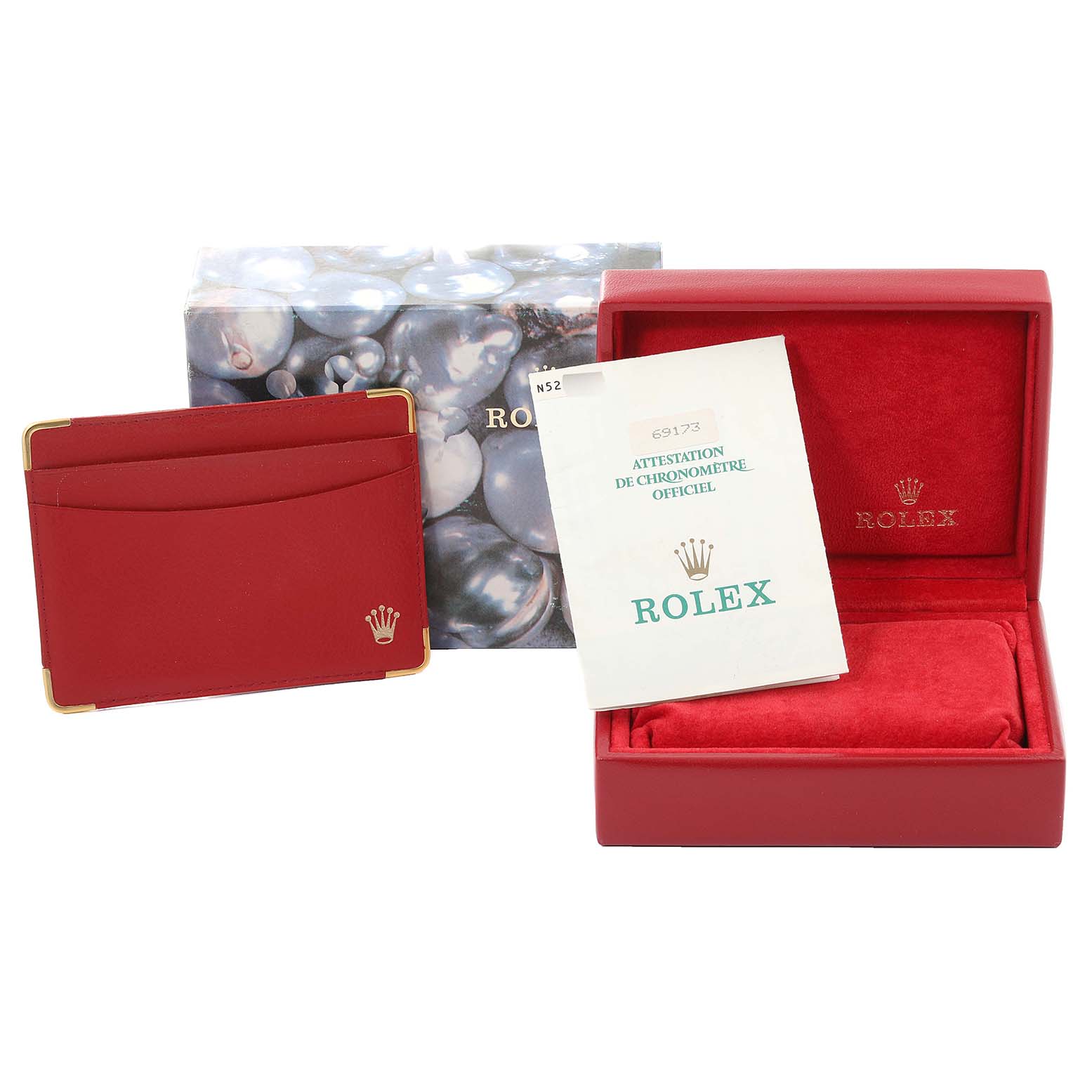 The image shows accessories for the Rolex Datejust 69173 Women's Steel and Gold (two tone) Grey Dial 69173 Women's Steel and Gold (two tone) Grey Dial model, including a red box, pouch, and an official chronometer certification.