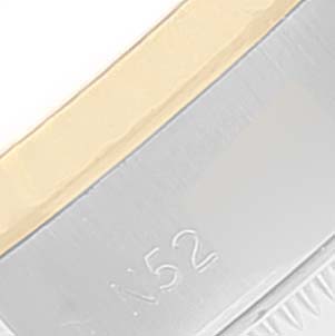 The image shows a close-up of the side of a Rolex Datejust 69173 Women's Steel and Gold (two tone) Grey Dial 69173 Women's Steel and Gold (two tone) Grey Dial watch case, focusing on the edge and engraving.