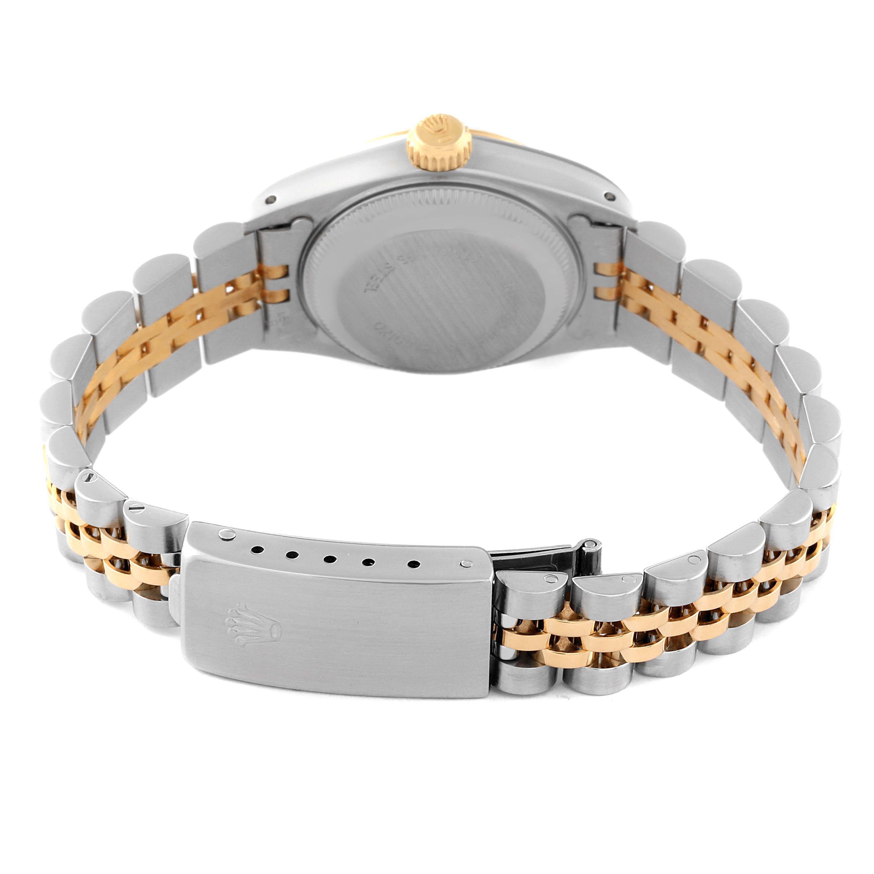 This image shows the back view of a Rolex Datejust 69173 Women's Steel and Gold (two tone) Grey Dial 69173 Women's Steel and Gold (two tone) Grey Dial watch highlighting its case back, crown, and Jubilee bracelet with a clasp.