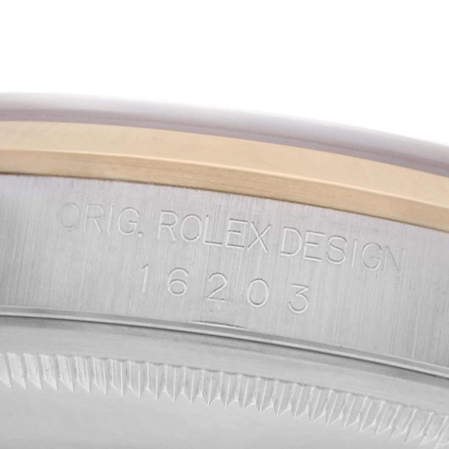 The image shows a close-up of the side of a Rolex Datejust 16203 Men's Steel and Gold (two tone) Grey Dial 16203 Men's Steel and Gold (two tone) Grey Dial, highlighting the model number and bezel.