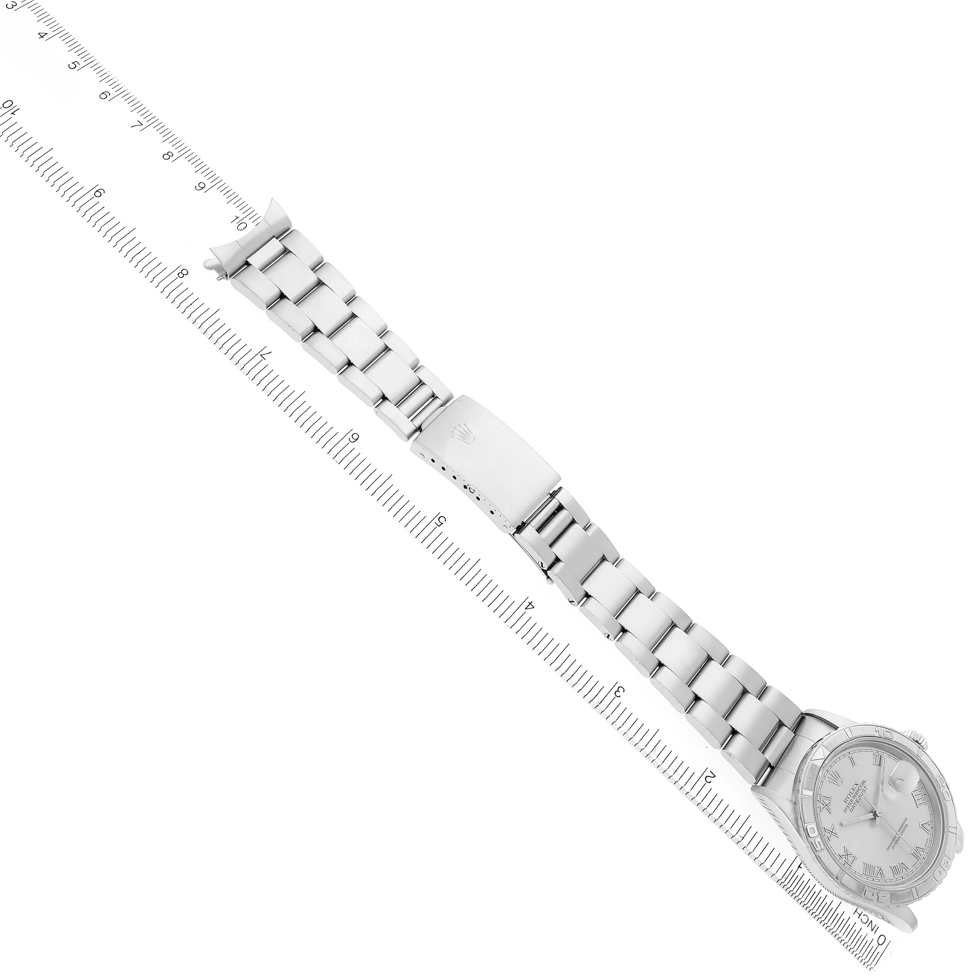 The image shows the Rolex Turn-o-Graph 16264 Men's Stainless Steel Silver Dial 16264 Men's Stainless Steel Silver Dial watch from a top-down angle, displaying its full bracelet and clasp alongside a ruler.