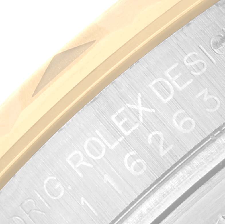 The image shows a close-up of the bezel and case side of the Rolex Turn-o-Graph 116263 Men's Steel and Gold (two tone) White Dial 116263 Men's Steel and Gold (two tone) White Dial, highlighting the model and design engraving.