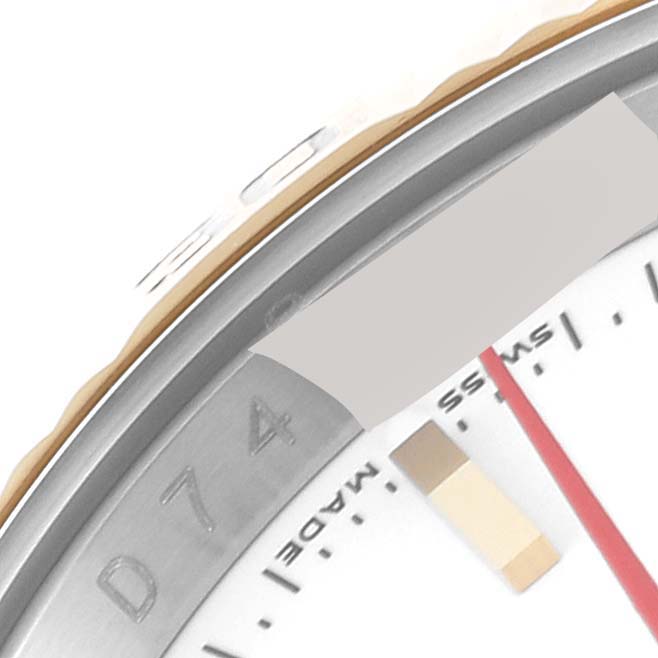 This close-up image shows a partial view of the dial and bezel of a Rolex Turn-o-Graph 116263 Men's Steel and Gold (two tone) White Dial 116263 Men's Steel and Gold (two tone) White Dial model watch.