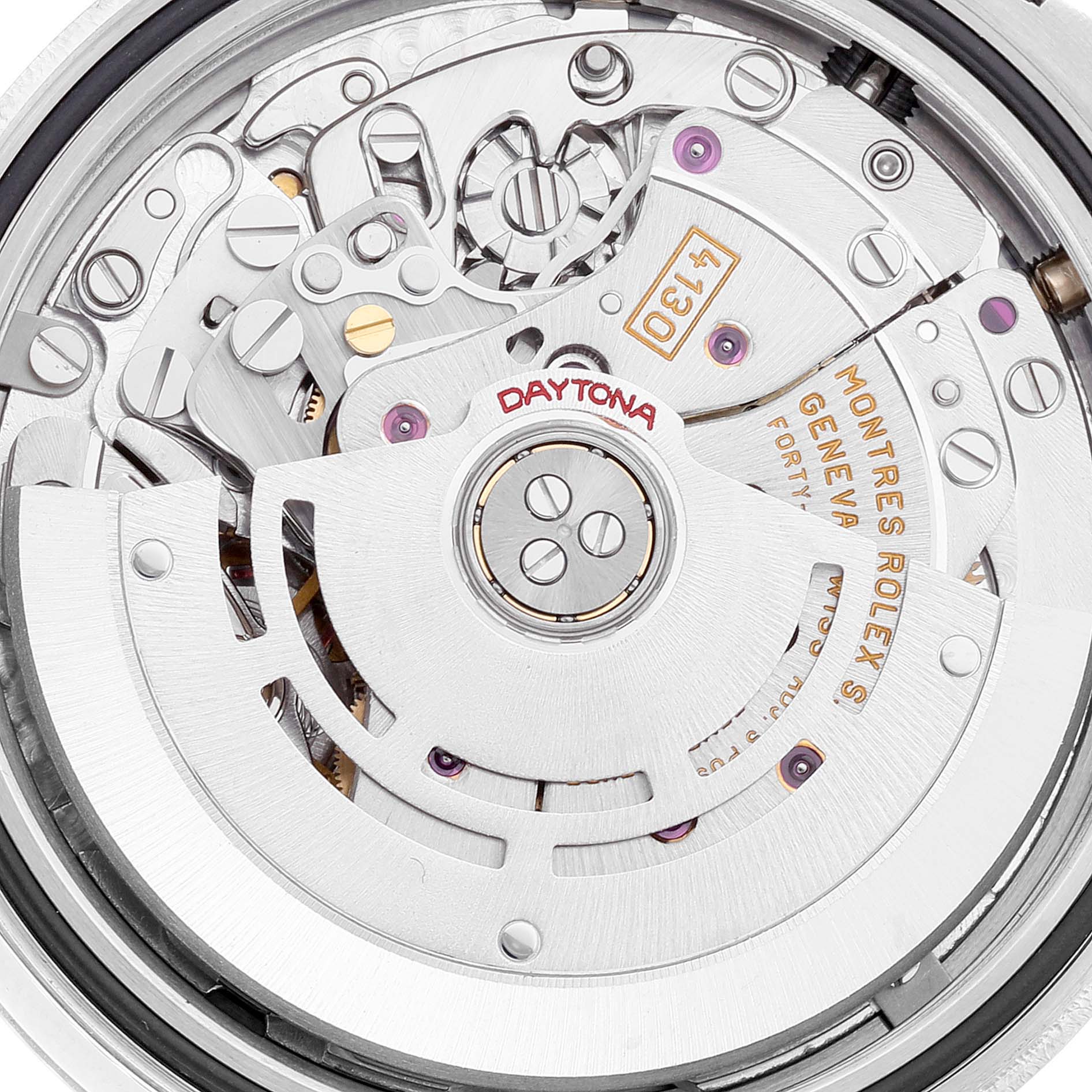 The image shows a close-up view of the Rolex Daytona 116523 Men
s Steel and Gold (two tone) White Dial 116523 Men
s Steel and Gold (two tone) White Dial watch
s movement mechanism.