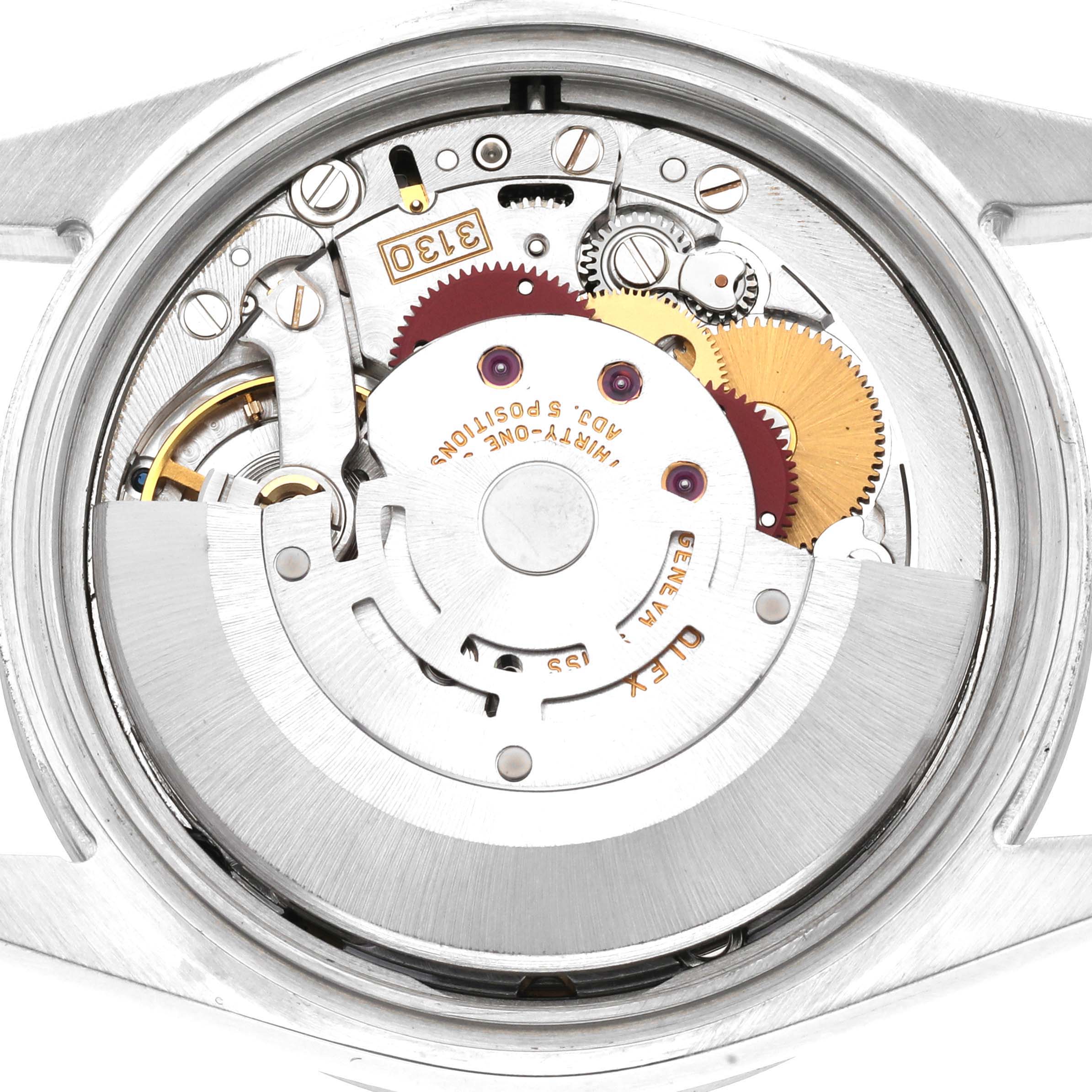 The image shows the internal mechanism and components of a Rolex Explorer 114270 Men
s Stainless Steel Black Dial 114270 Men
s Stainless Steel Black Dial watch from a rear angle.