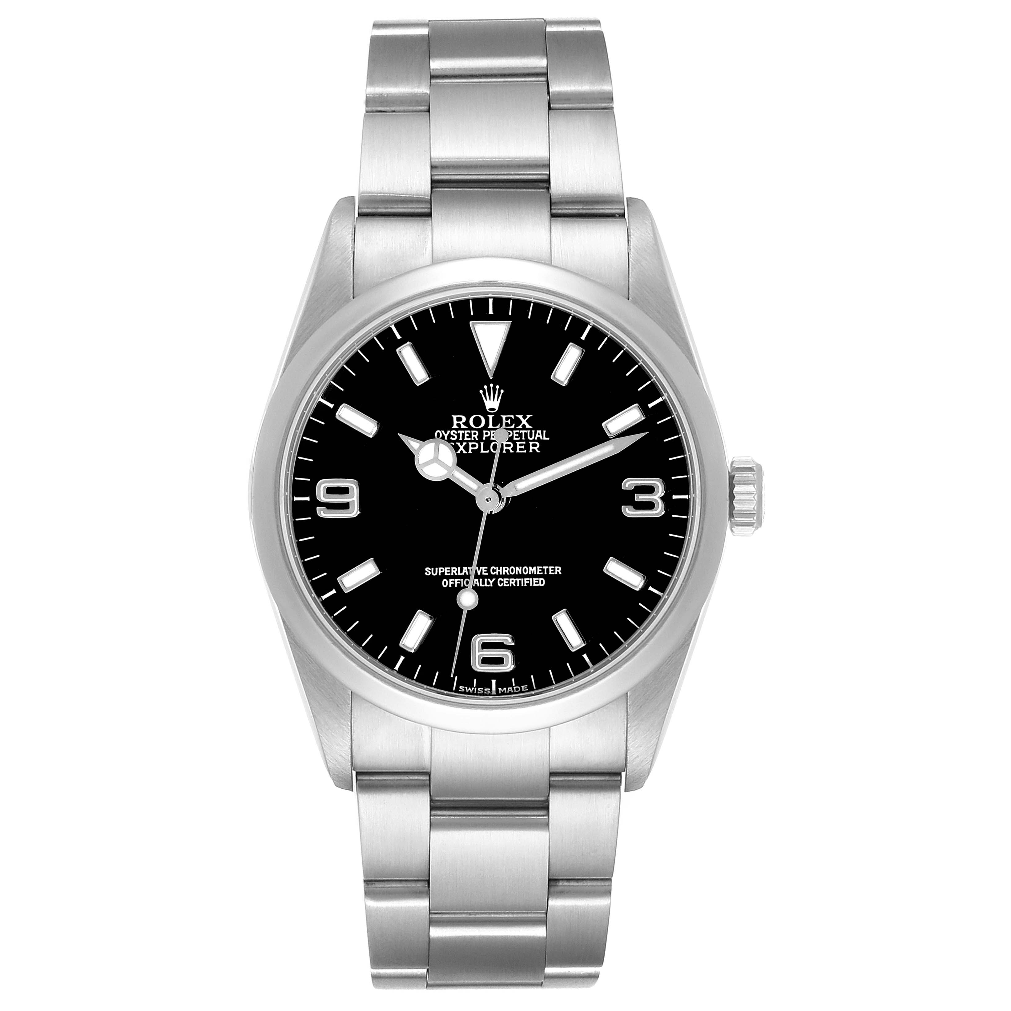 The Rolex Explorer 114270 Men
s Stainless Steel Black Dial 114270 Men
s Stainless Steel Black Dial watch is shown from the front, displaying the face, hands, crown, and part of the stainless steel bracelet.