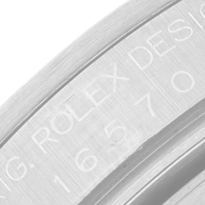 This image shows a close-up angle of the caseback with engravings on a Rolex Explorer 16570 Men
s Stainless Steel Black Dial 16570 Men
s Stainless Steel Black Dial watch.