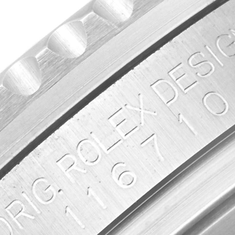 This image shows a close-up of the bezel and engraved model number on the case of a Rolex GMT-Master 116710 Men
s Stainless Steel Black Dial 116710 Men
s Stainless Steel Black Dial watch.