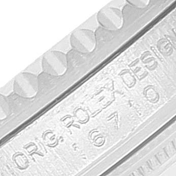 This image shows a close-up of the engraved bezel and case side of a Rolex GMT-Master 16710 Men's Stainless Steel Black Dial 16710 Men's Stainless Steel Black Dial watch.