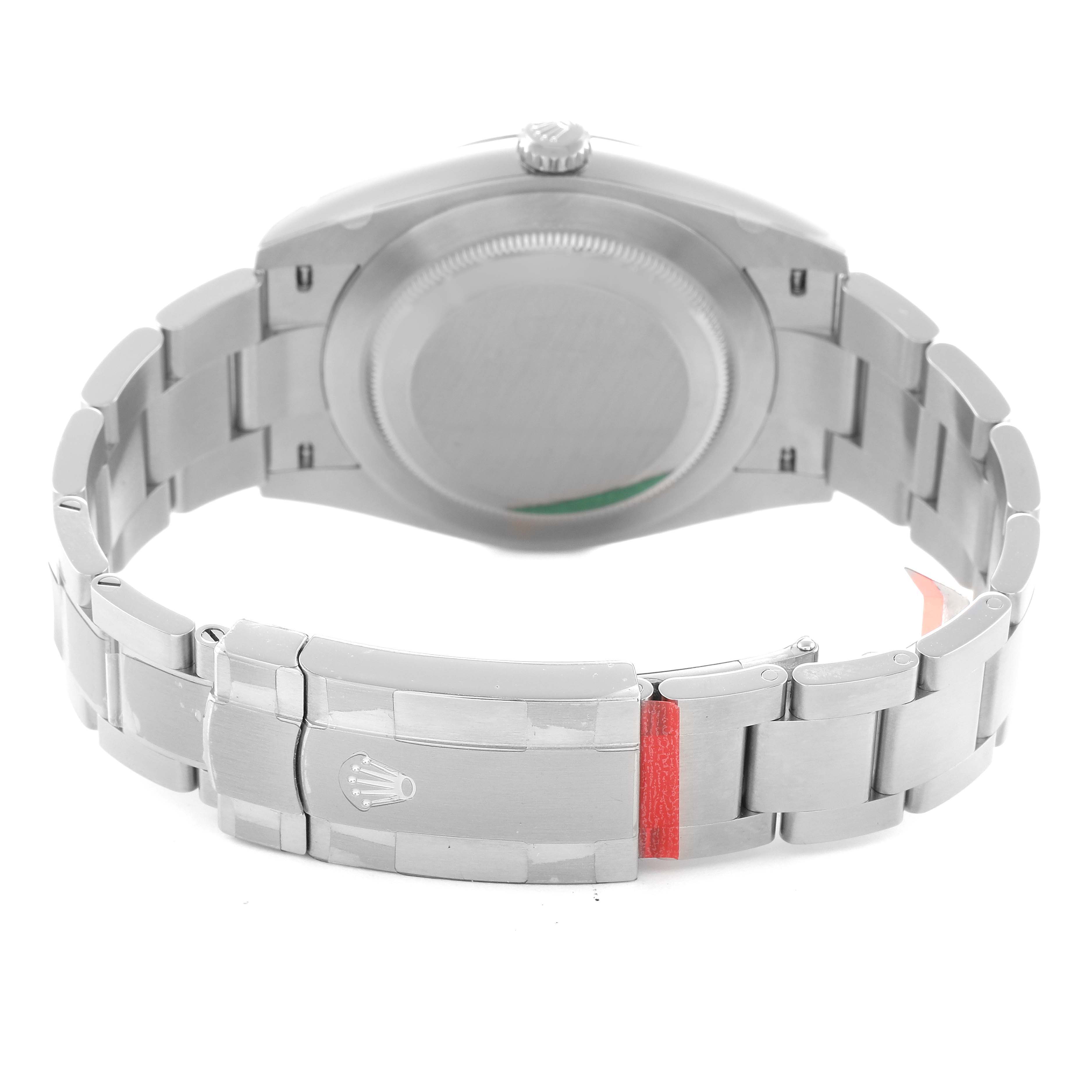 The image shows the back view of a Rolex Oyster Perpetual 124300 Men's Stainless Steel Green Dial 124300 Men's Stainless Steel Green Dial, highlighting the closed bracelet clasp and case back.