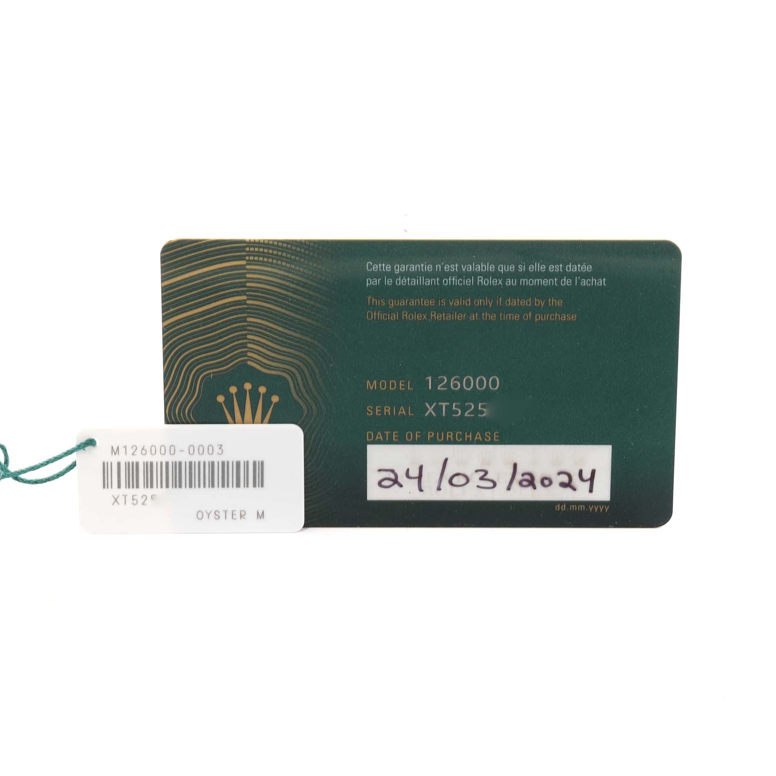 The image shows the warranty card and tag for a Rolex Oyster Perpetual 126000 Men
s Stainless Steel Blue Dial 126000 Men
s Stainless Steel Blue Dial model 126000, displaying the serial number and purchase date.