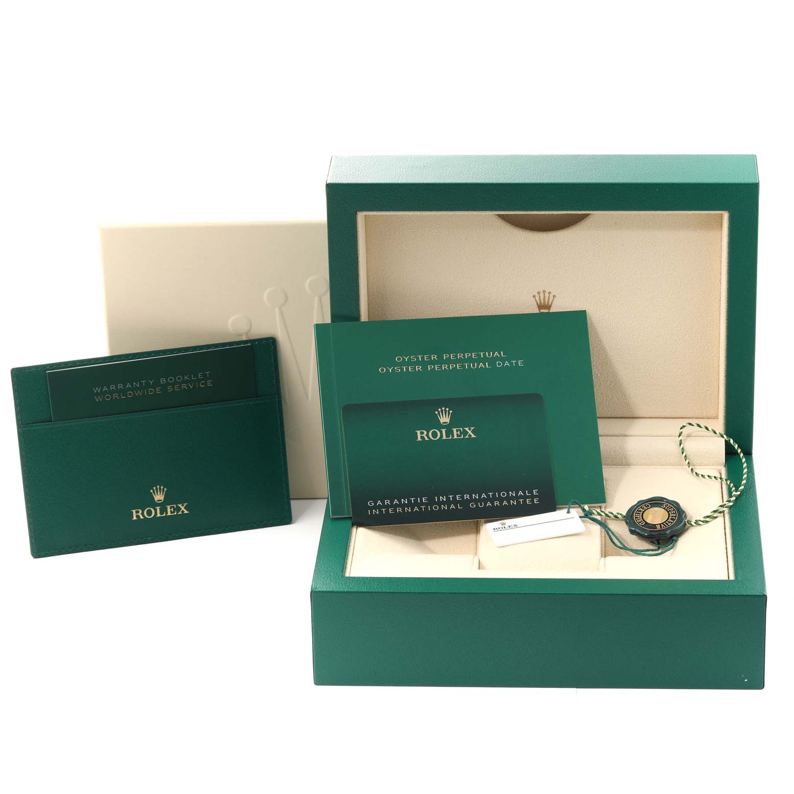 The image shows the Rolex Oyster Perpetual 126000 Men
s Stainless Steel Blue Dial 126000 Men
s Stainless Steel Blue Dial model
s packaging, including the warranty booklet, international guarantee card, and green watch box.